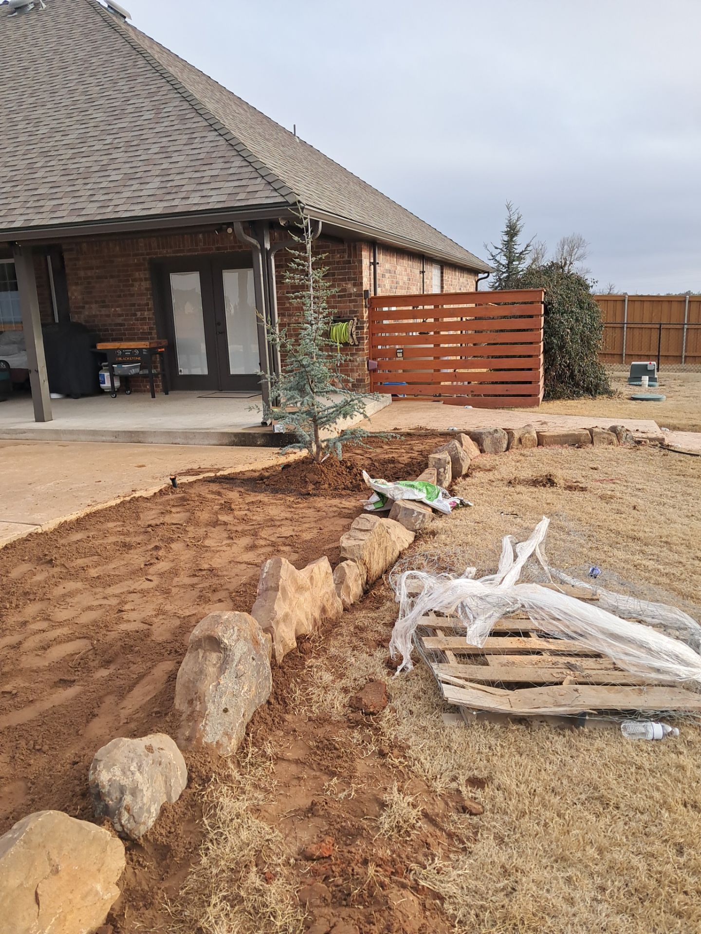 Landscape installation w/ irrigation and landscape lighting by Clays Services Inc