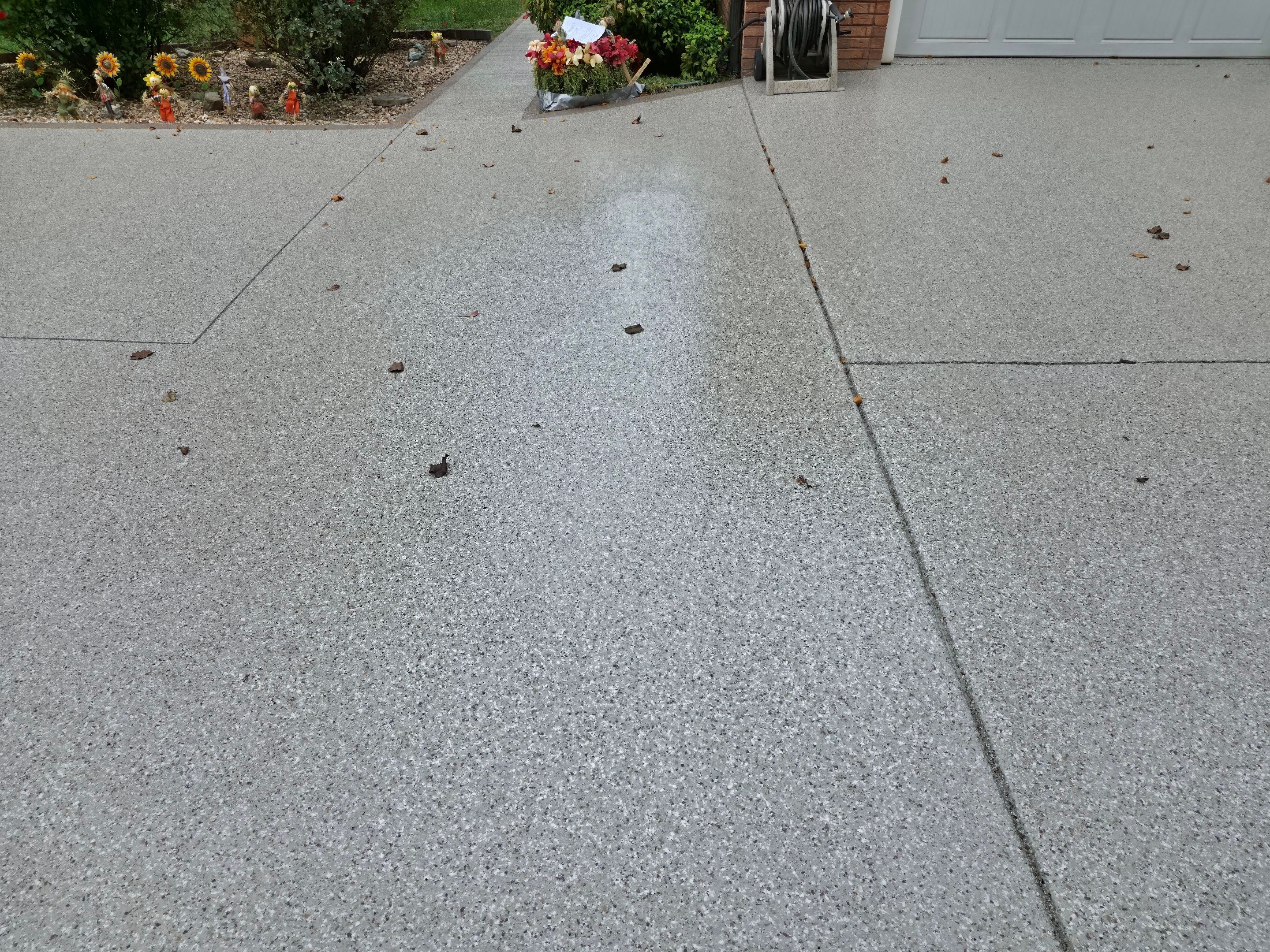 Driveway Using Creekbed and Garnet by Elite Floor Solutions