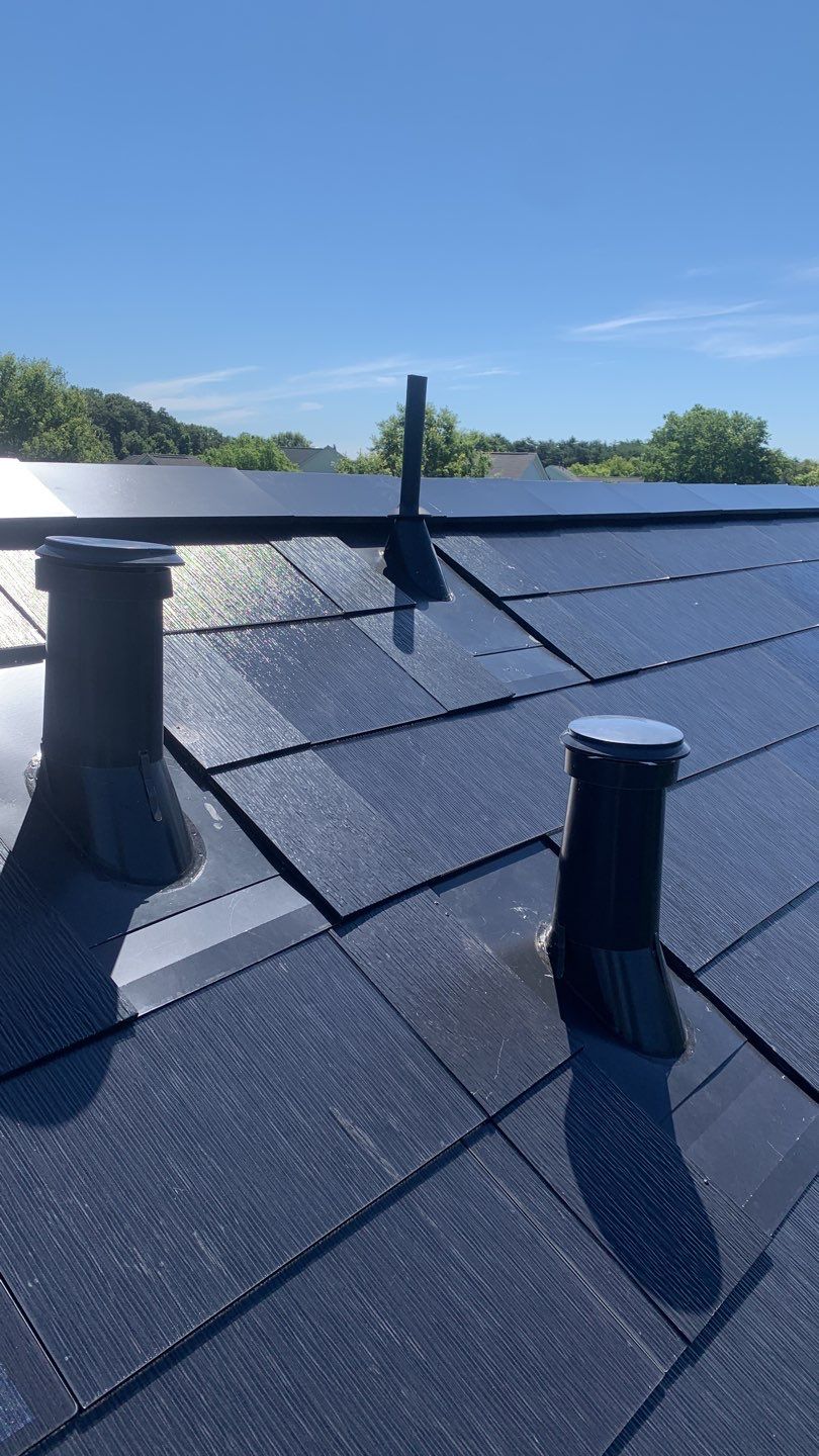 Tesla Solar Roof Replacement using Tesla Solar Roof V3 tiles by American Home Contractors