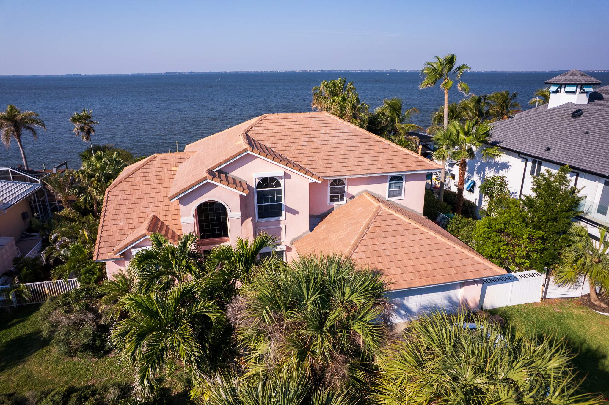Full Clay Tile Roof Replacement and Deck Repair in Cocoa Beach, Florida by Wiedmann Construction & Roofing