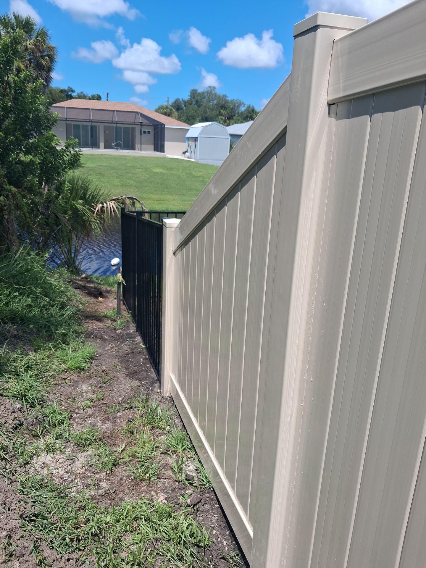 Vinyl Privacy Fencing and Aluminum Pool Security Installation in Port Charlotte by True Fence LLC