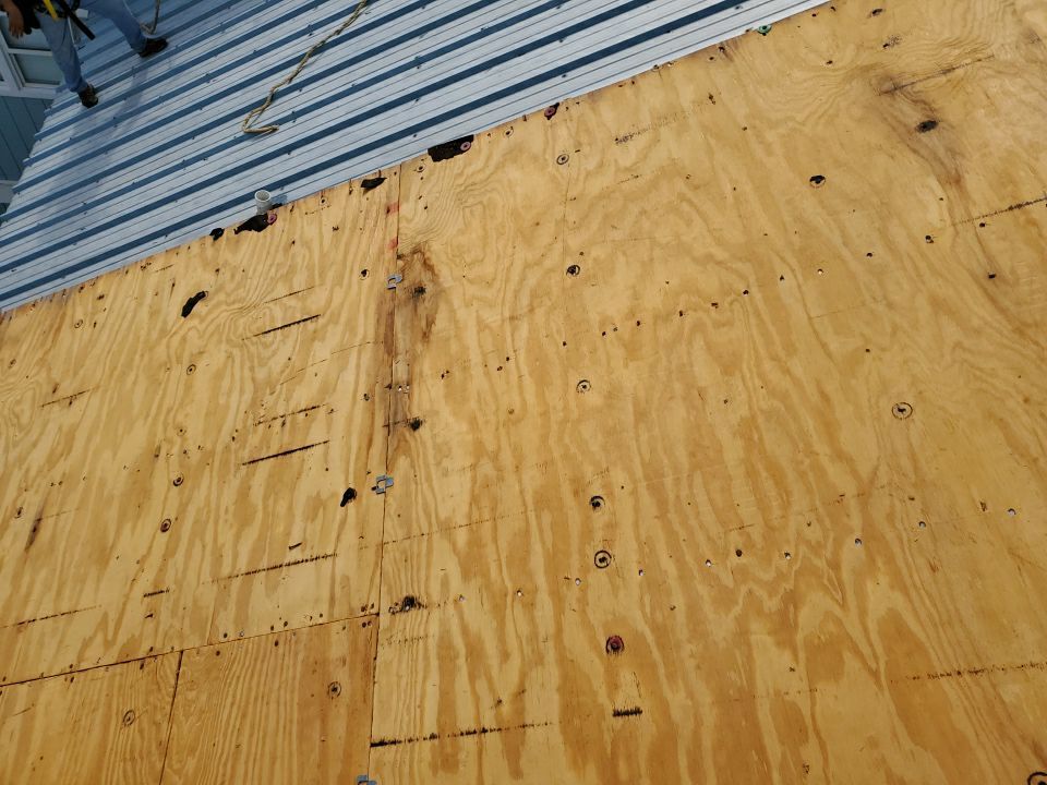 Commercial Roofing Installation using Metal roofing by American Roofing & Construction LLC