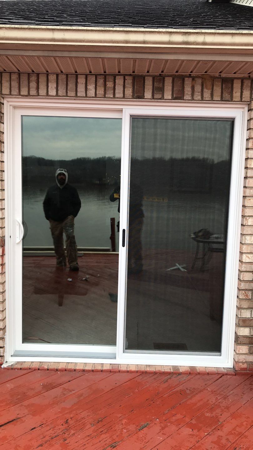 Deck Refurbush and Door Replacement using Trex Decking and Railing. Polaris Patio Doors by Secure Construction Company Inc