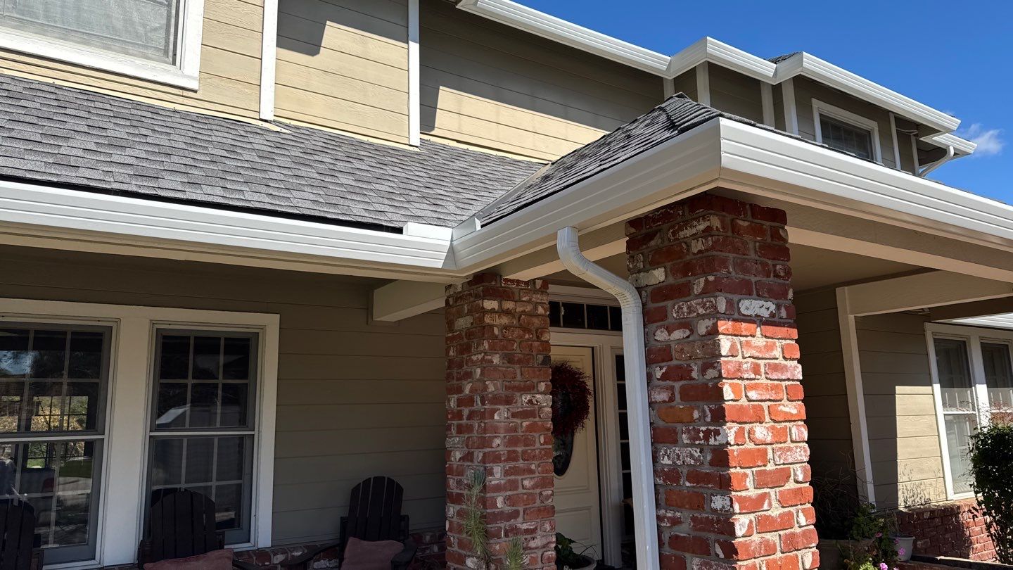 New shingles and gutters using GAF Timberline HDZ shingles and aluminum gutter by Straight Edge Roofing Inc