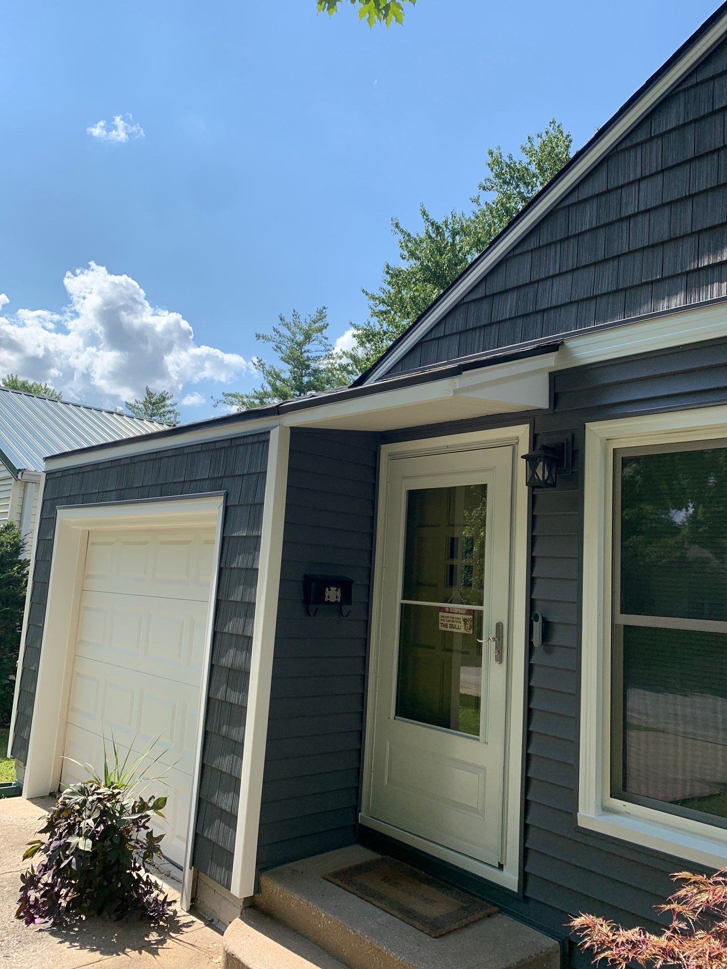 NKC Happy Blues by EEC Windows, Siding & Roofing