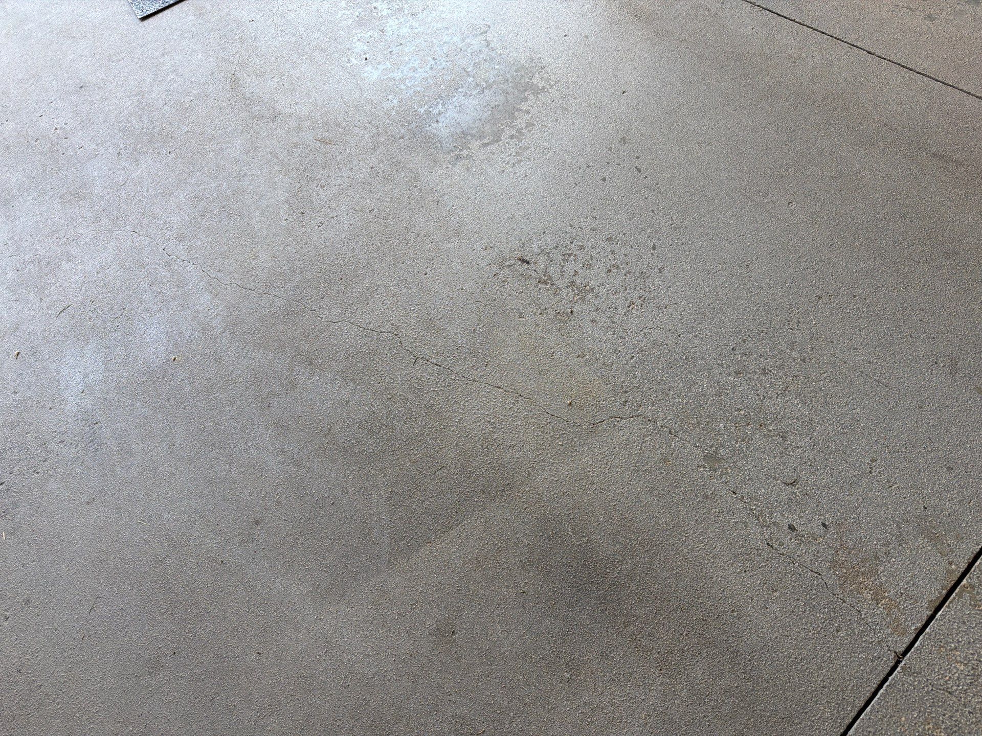 Sioux Falls Garage Floor Coating with Nightfall Decorative Chips by Select Painting, Coatings & Garage Cabinets
