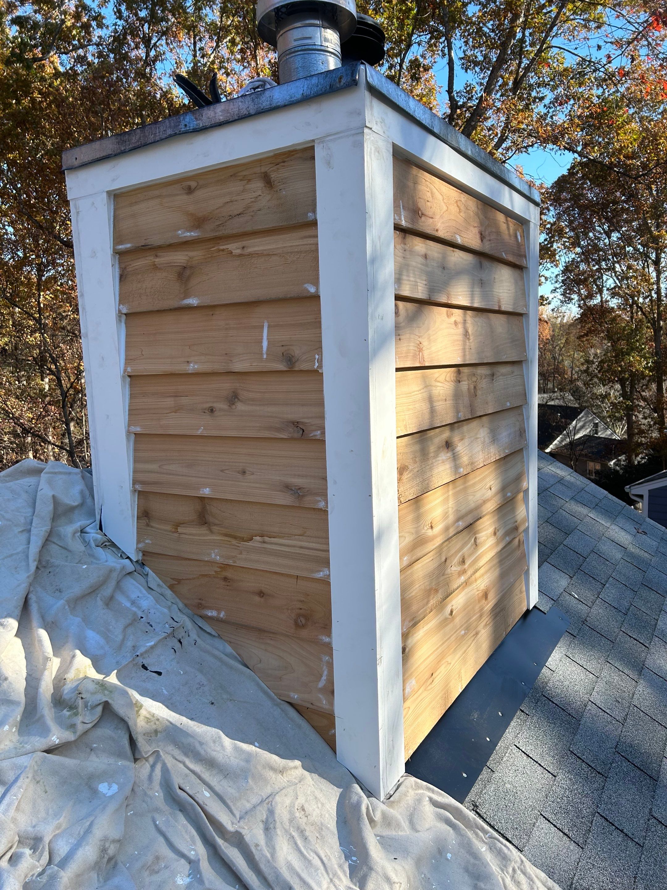 Roof Repairs/Chimney Siding  by Pro Performance Roofing