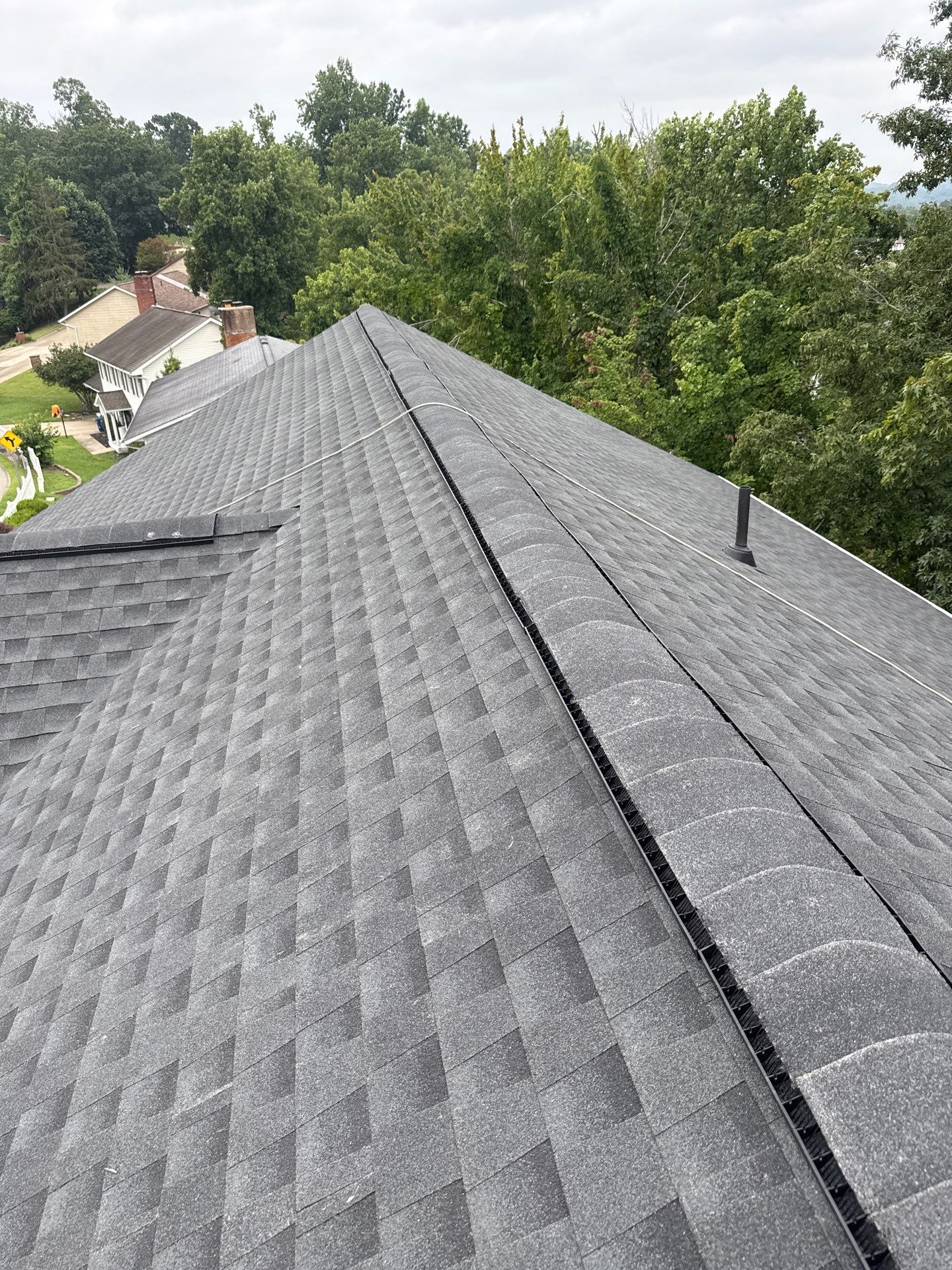 Residential Roofing Installation using GAF Timberline HDZ Charcoal by Rainstoppers Roofing