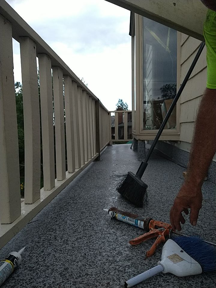 Residential Roofing Installation, Dec-tek walk-out porch roof, siding on garage by Absolute Roofing and Construction