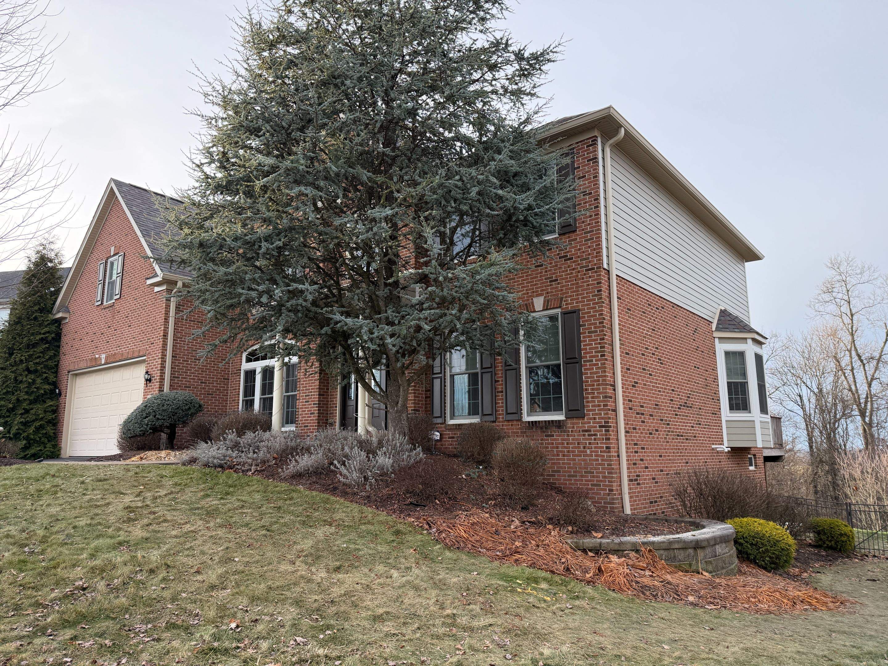 Partial Siding Renovation with Tan Vinyl Siding in Canonsburg by Ideal Siding Pittsburgh