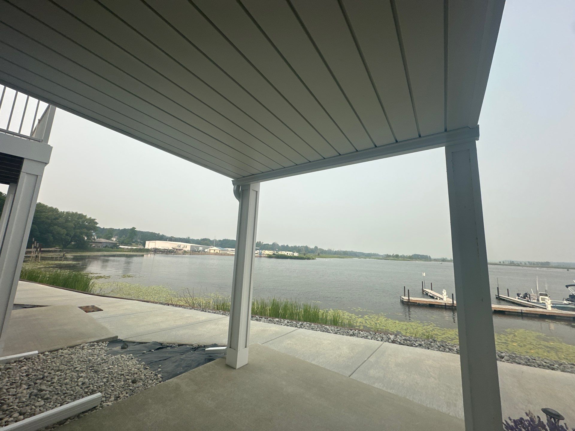 Underdecking Installation for Waterfront Townhouse in Manistee by Rainbow Seamless Systems