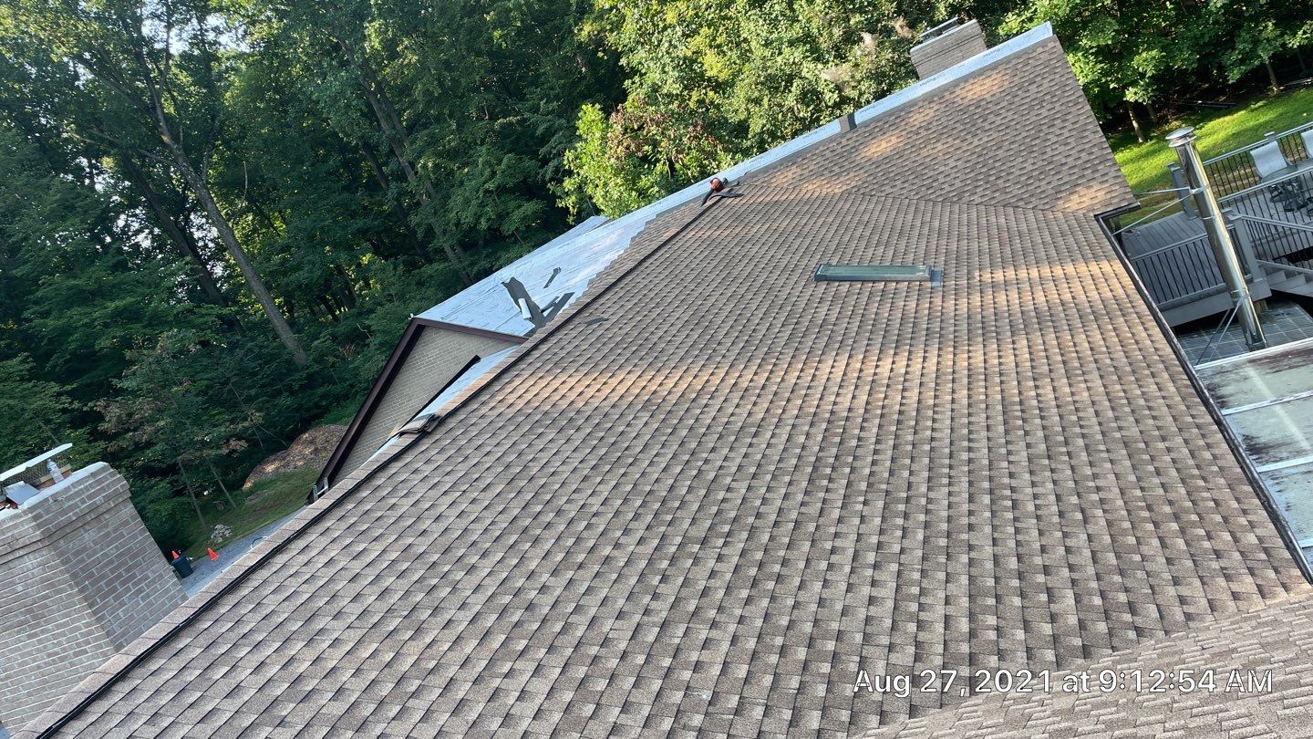 Roof Replacement using GAF Timberline HDZ by American Home Contractors
