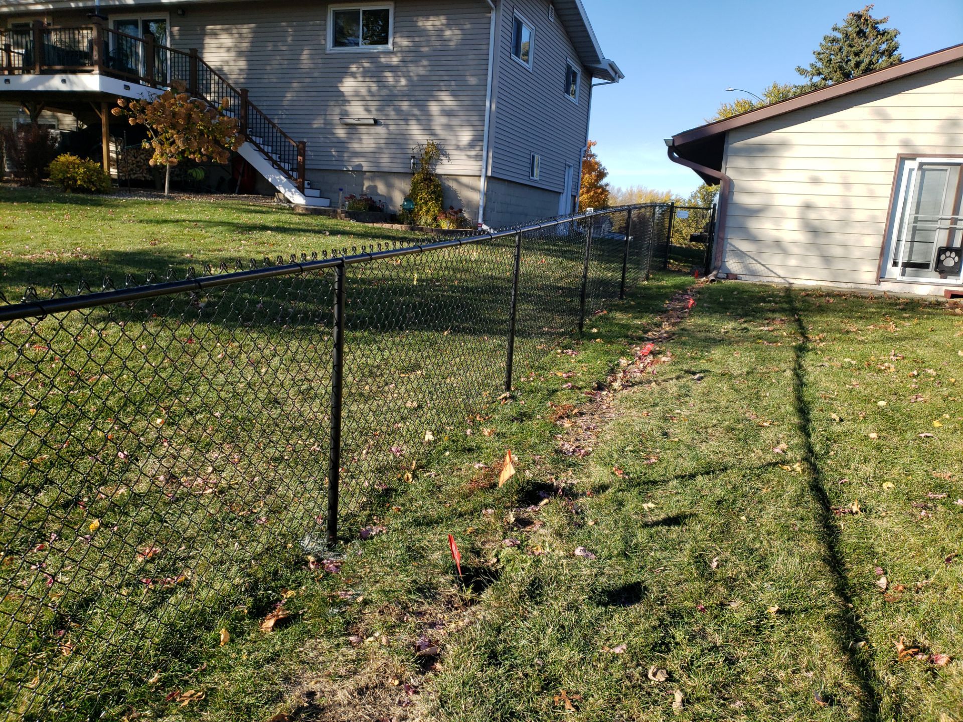Black Chain Link Fence and Gate Installation in Cedar Falls by Perfect Picket Fence and Stain