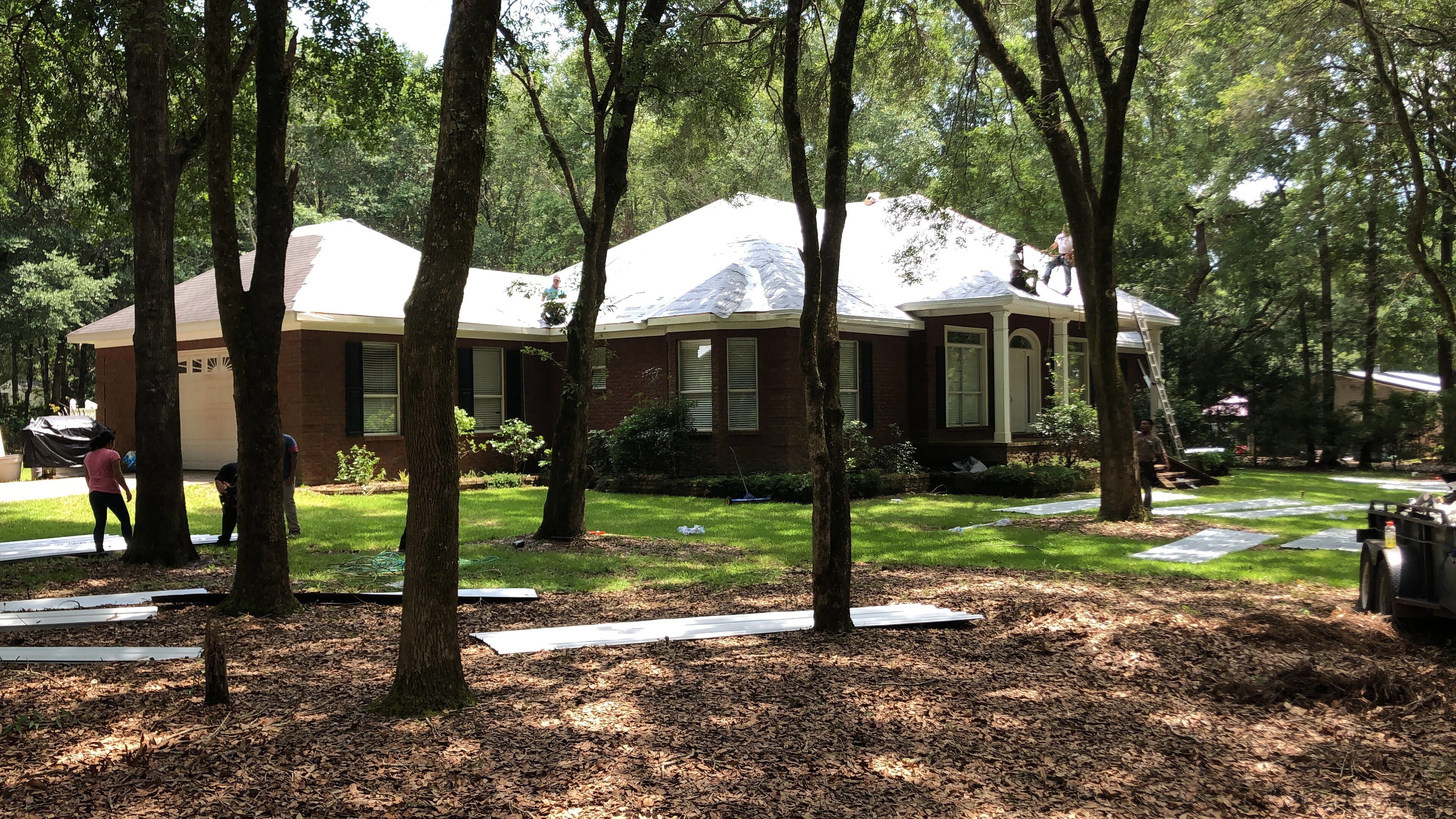 Residential Roofing Installation using Metal roofing by American Roofing & Construction LLC