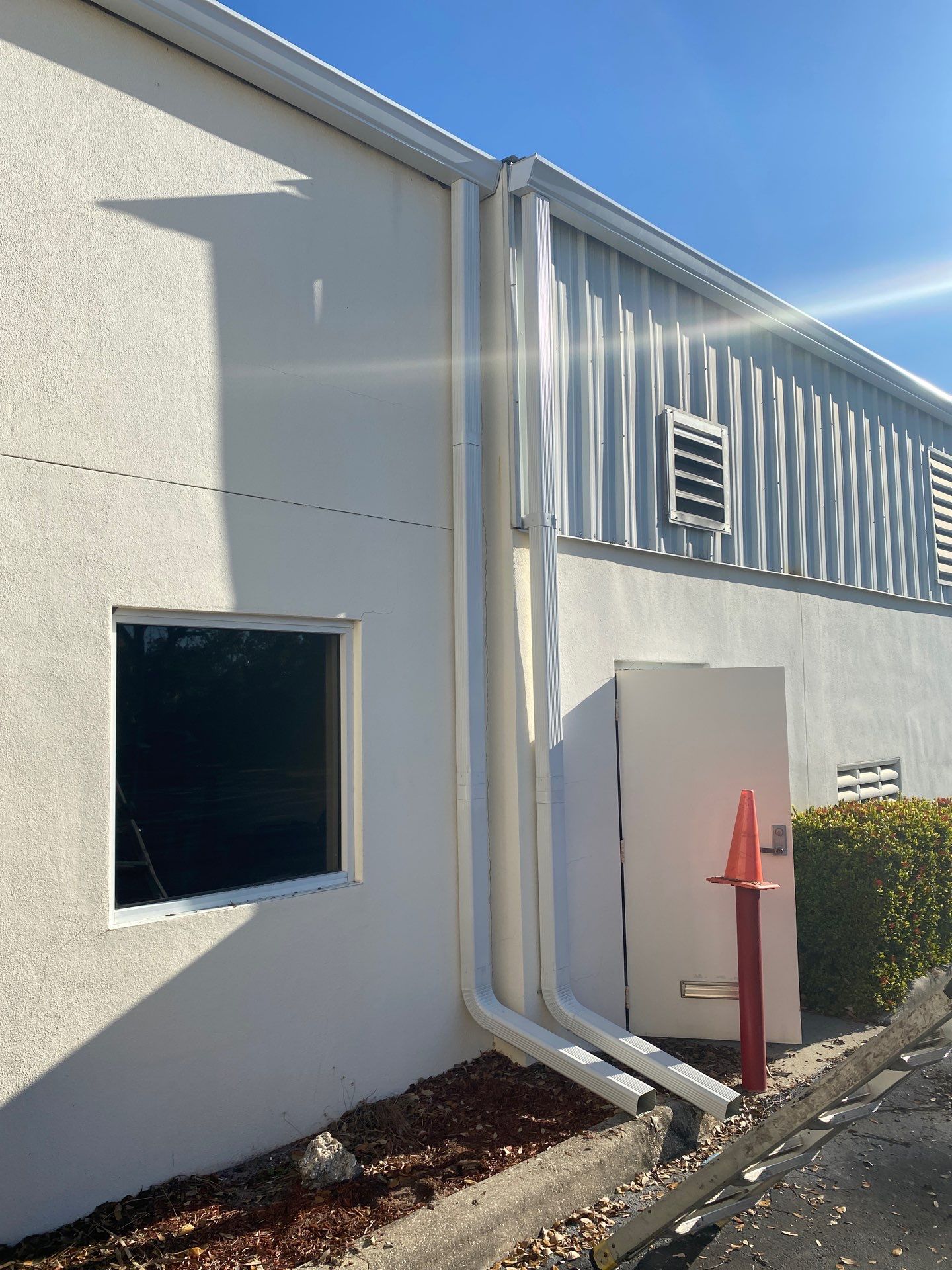 White 6-Inch Gutters with Downspouts in Bradenton FL by Gutter Professors