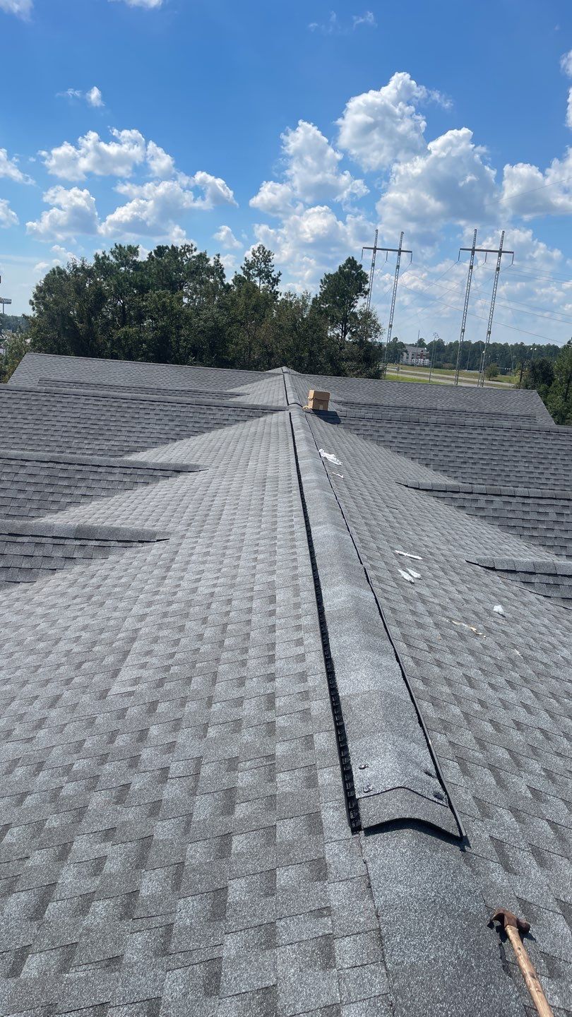 Commercial Roofing Installation using Roof Replacement by American Roofing & Construction LLC