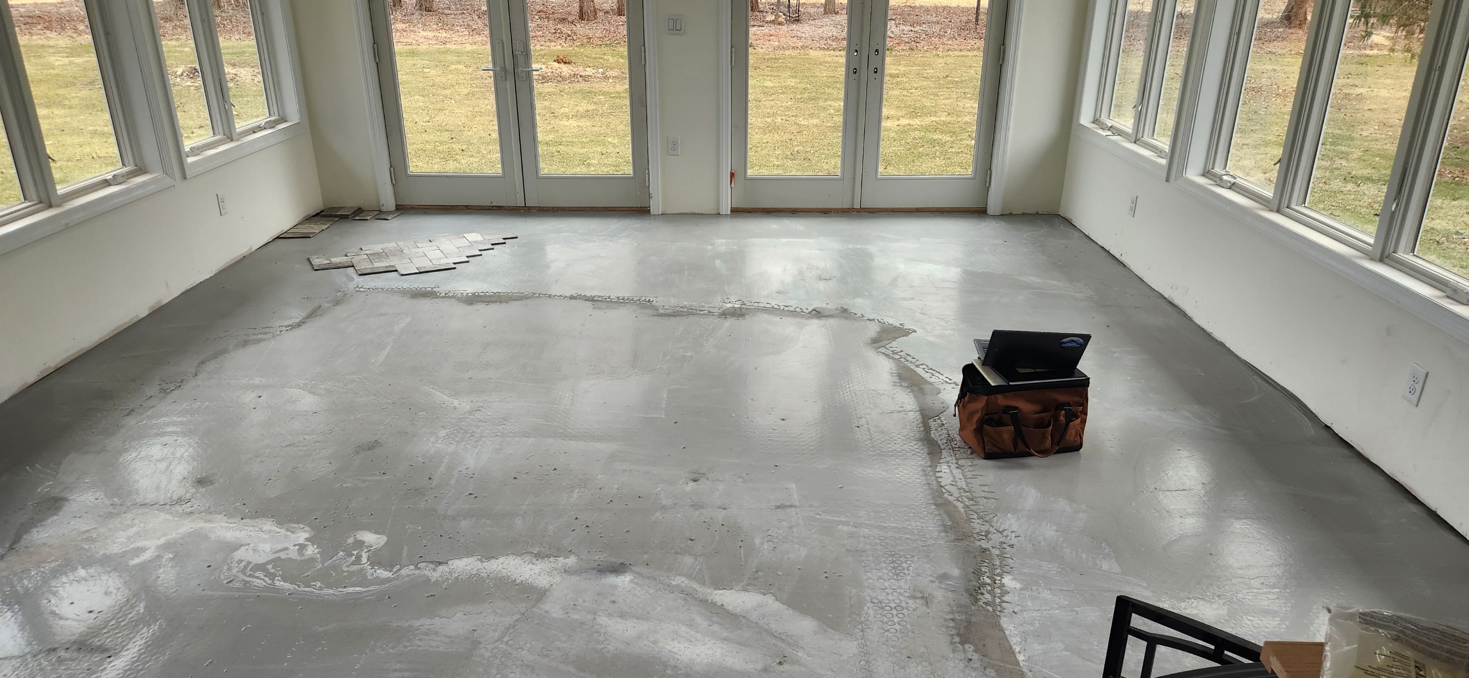4 Seasons Room with Ditra Heated Floor using multi pattern Subway Tiles by Footprints Floors Morristown