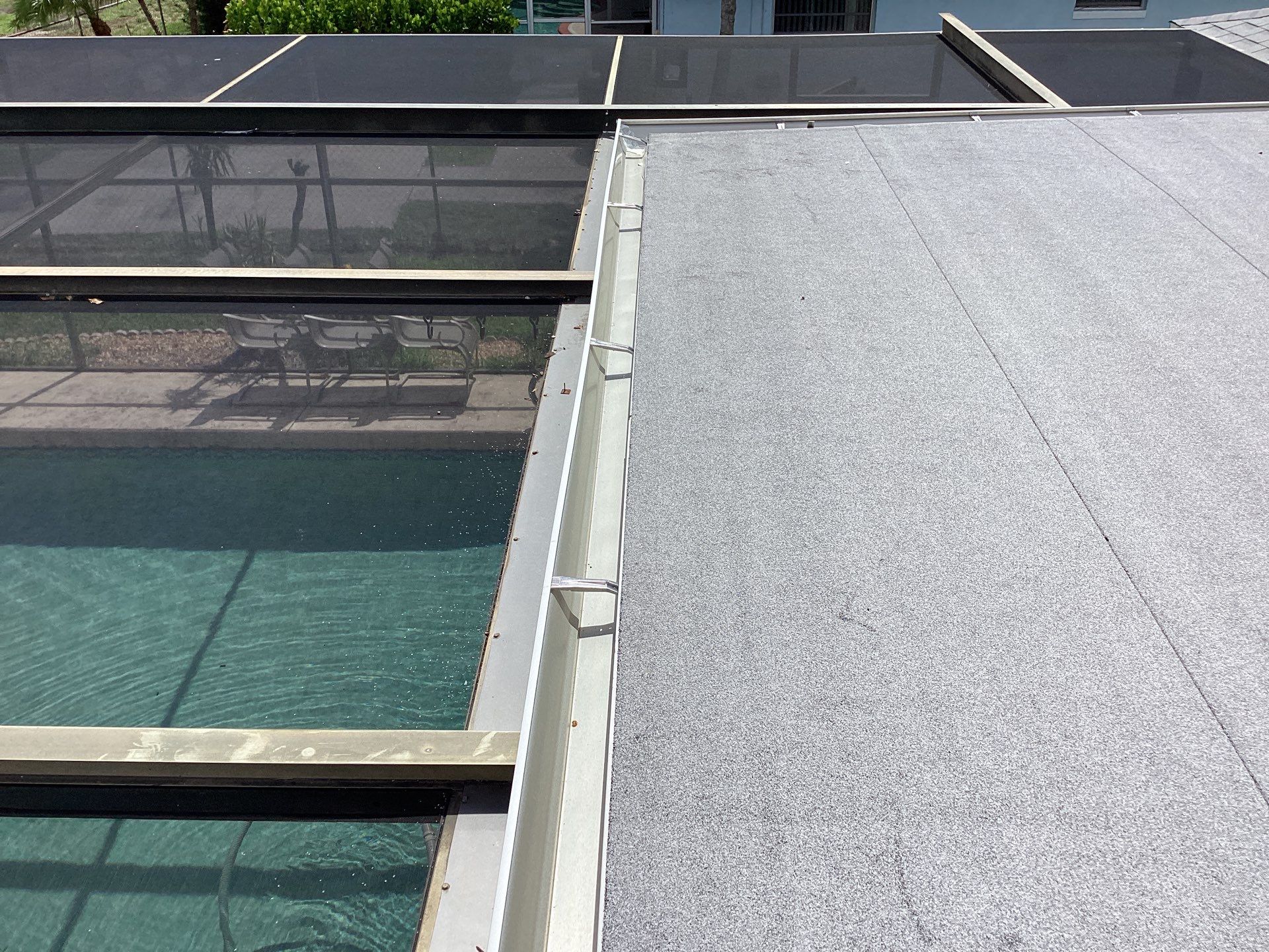 White Seamless Gutters and Splash Guards in Fort Myers FL by Gutter Professor by Gutter Professors