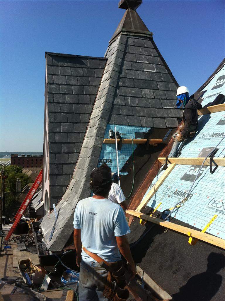 Historic Building ROOF REPLACEMNT with GAF TruSlate  on steep slop and Versico 60mil TPO on flat roof by Gorilla Exteriors Contracting, LLC