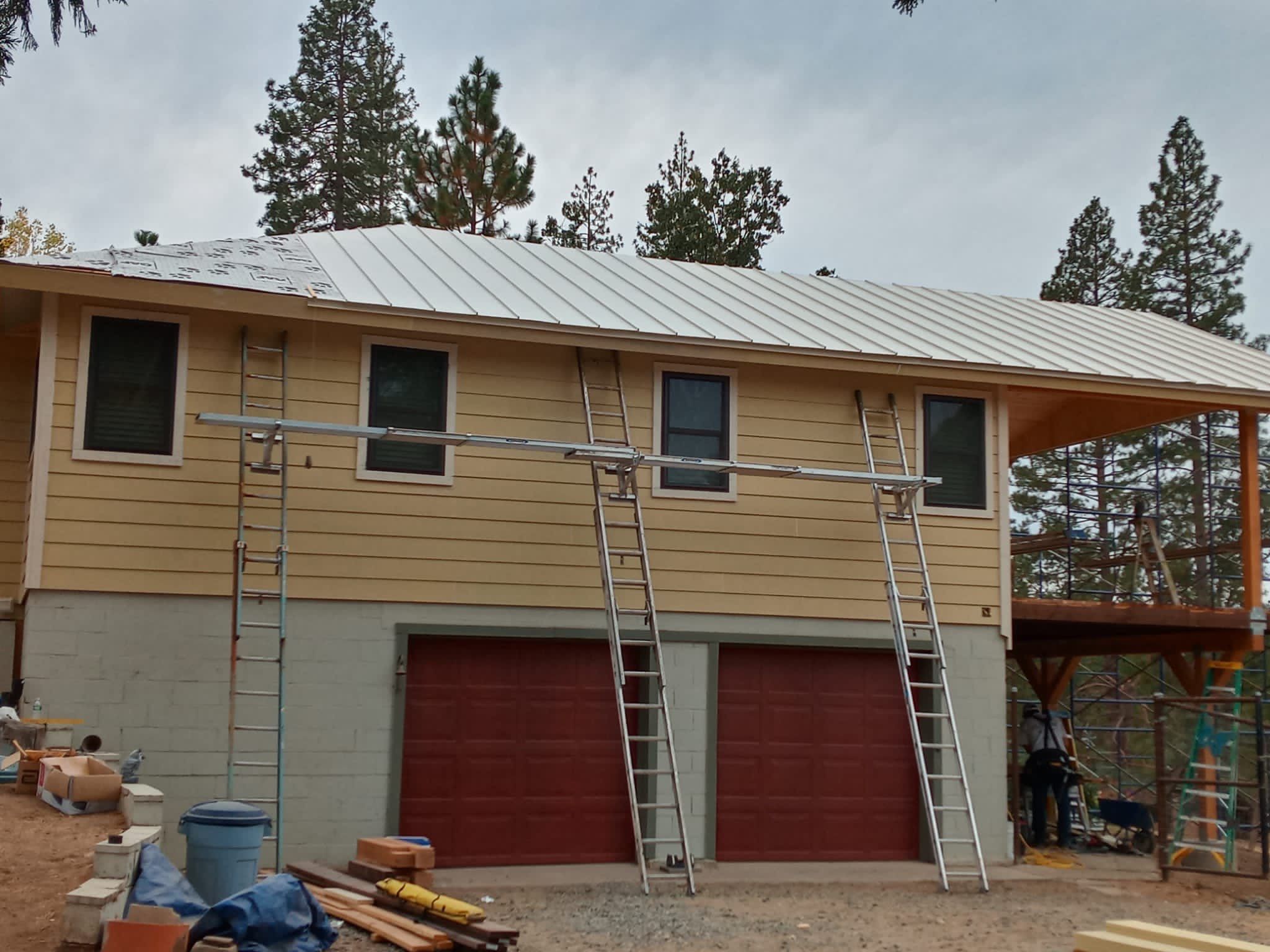 Residential Roofing Installation using Standing seam metal roofing system by Straight Edge Roofing Inc