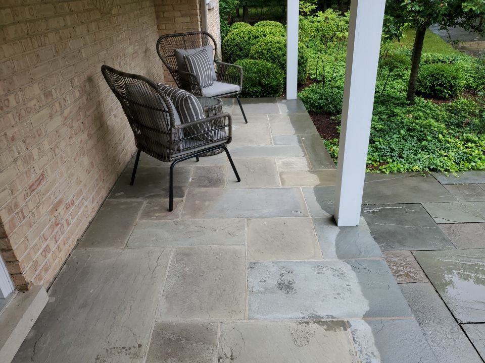 Bluestone patio cleaning by Northern Power Washing LLC.