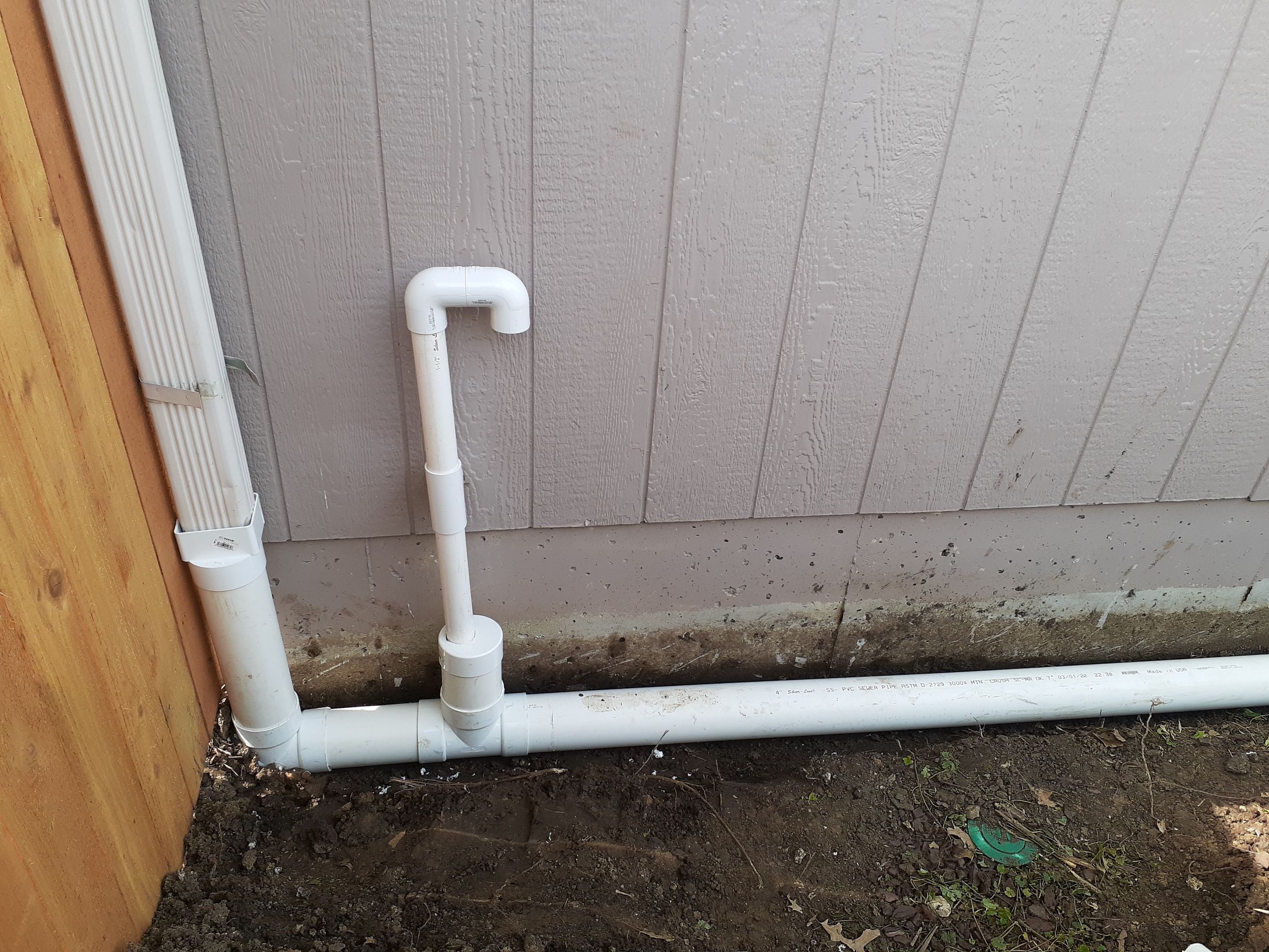 Drainage and Downspout Installation by LAND ESCAPES LLC