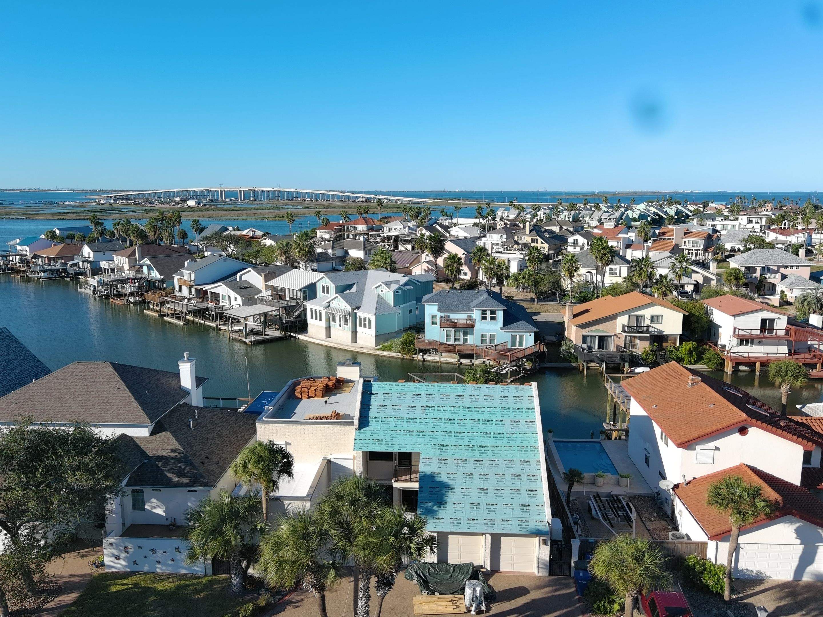 Off with the Tile and on with the TILCOR stone coated metal.  by Bayfront Roofing and Construction