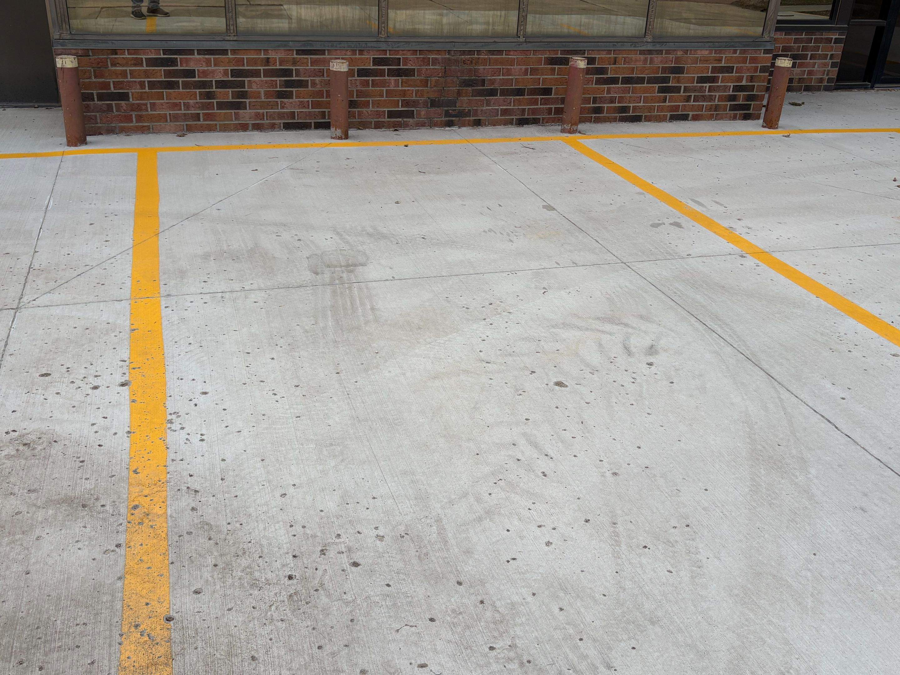 Commercial Shop Renovation and Concrete Parking Installation in Brookings by Select Painting, Coatings & Garage Cabinets