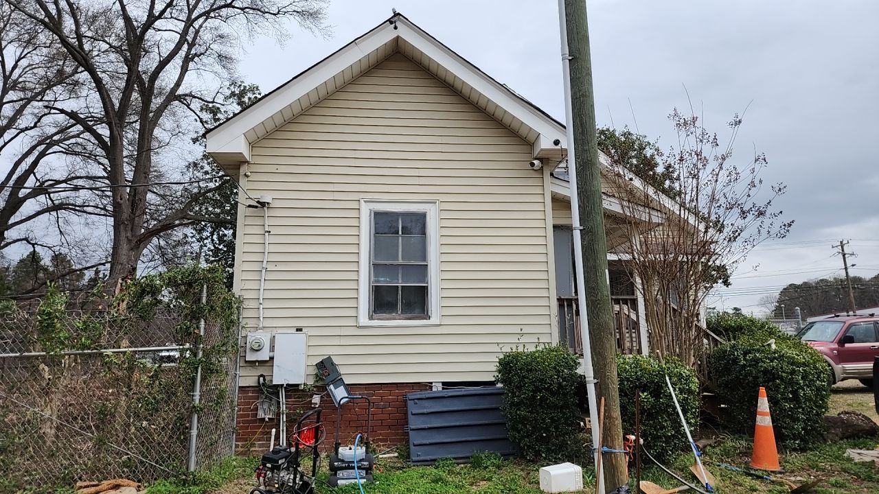 House Wash using cleaner by Power Wash Masters LLC