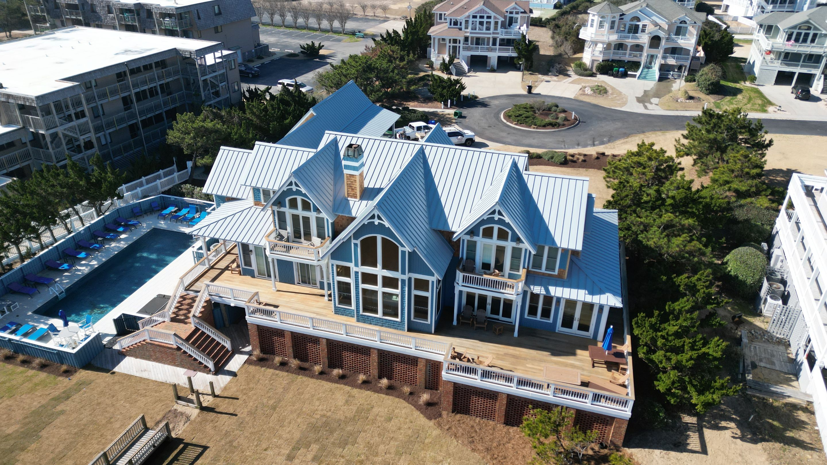 Large Metal Roof Transformation by Gallop Roofing & Remodeling, Inc.
