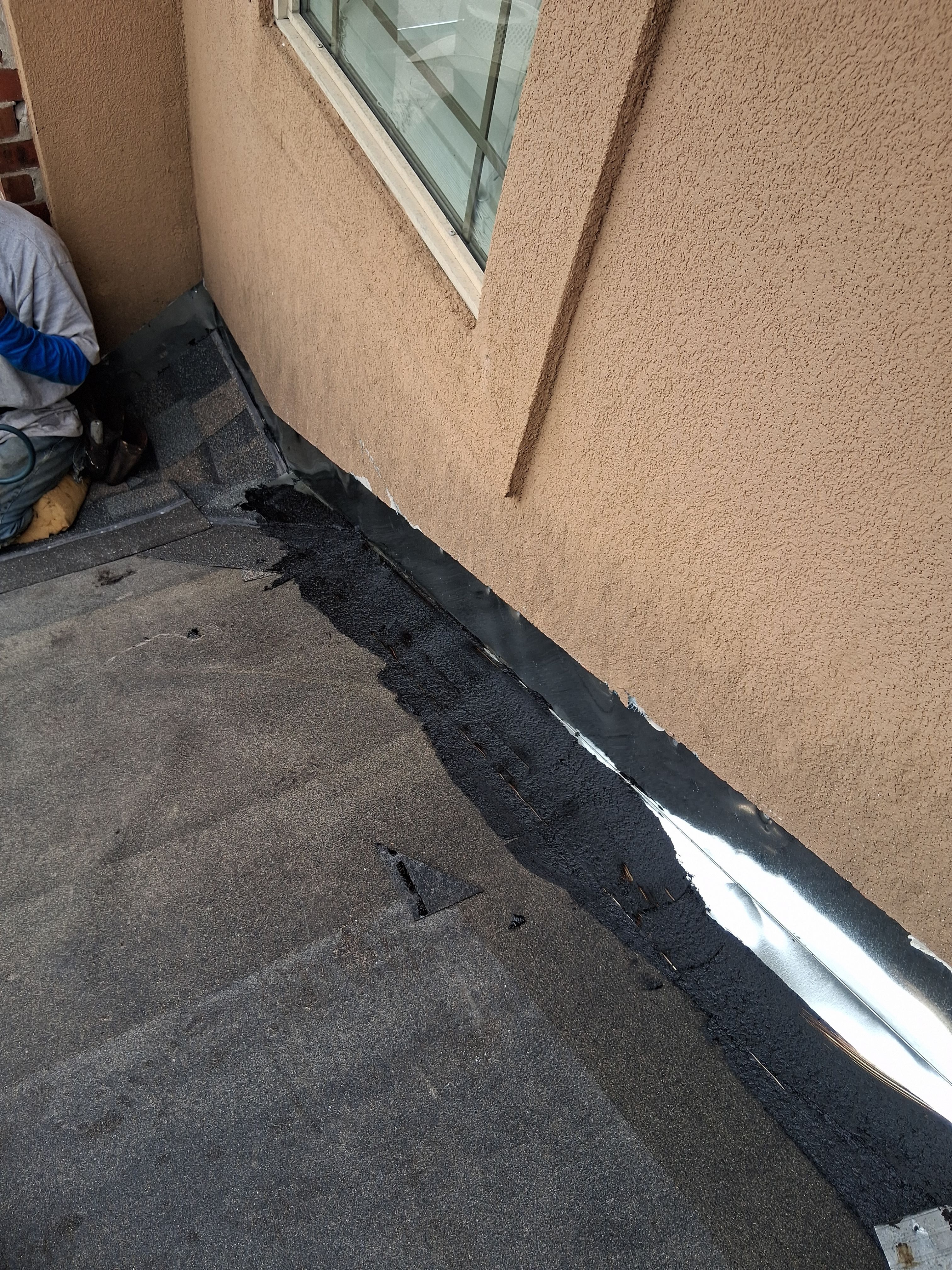 Flashing Stucco above the Roof by Bayfront Roofing and Construction