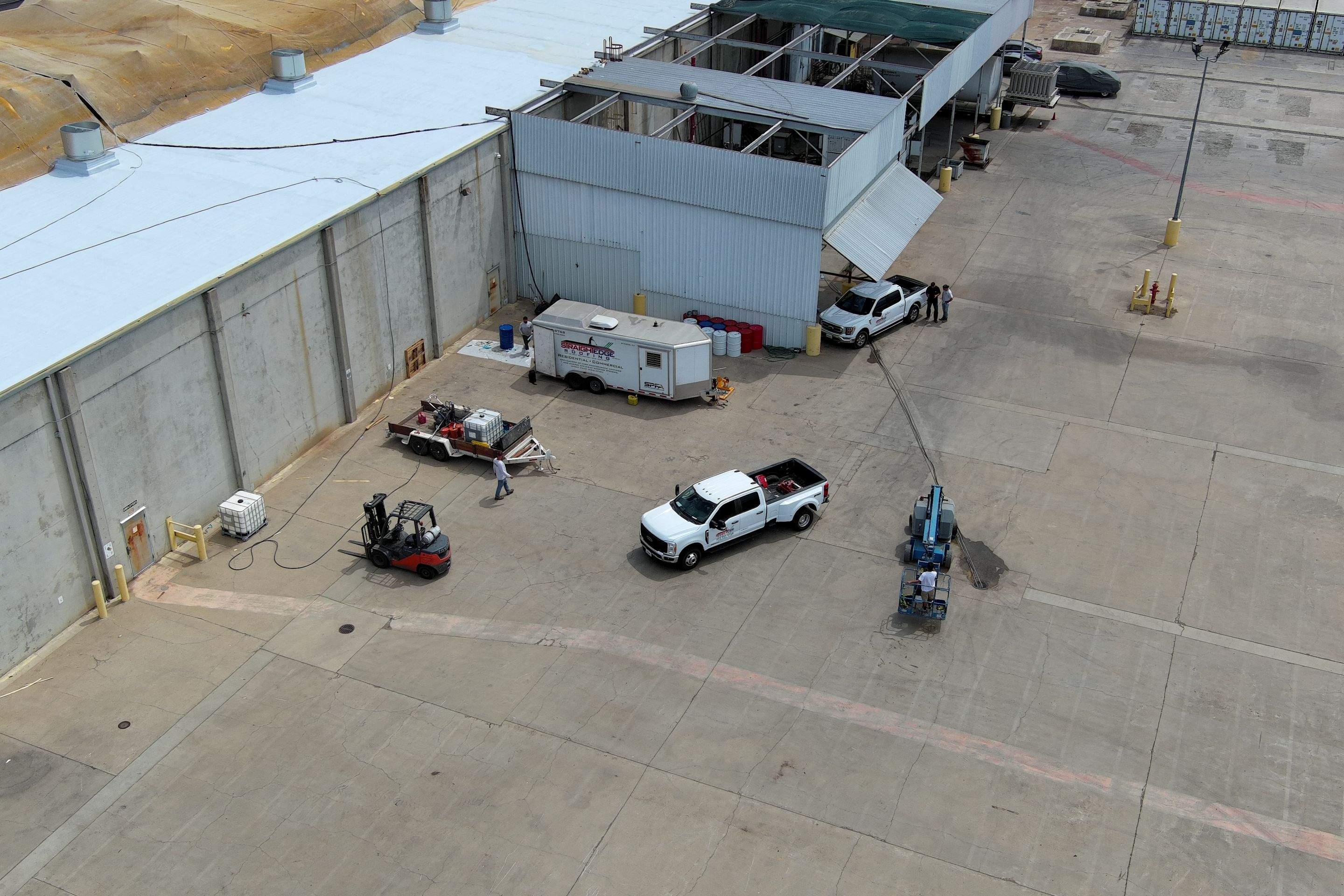 Pro Farms Spray foam roofing project by Straight Edge Roofing Inc