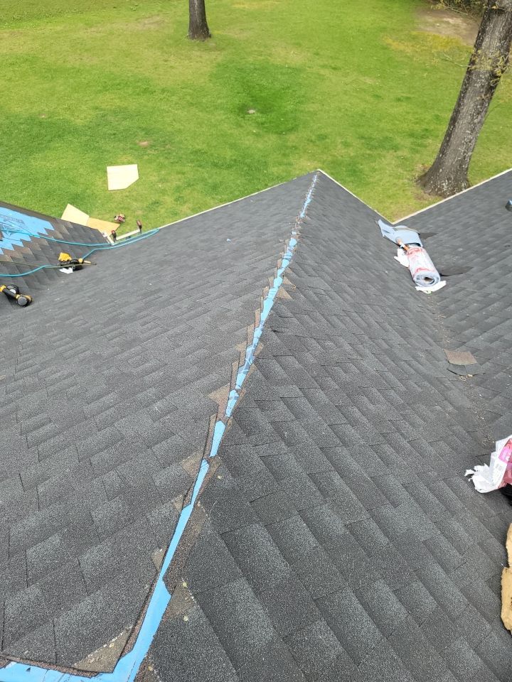 Residential Roofing Installation using Roof Replacement by American Roofing & Construction LLC