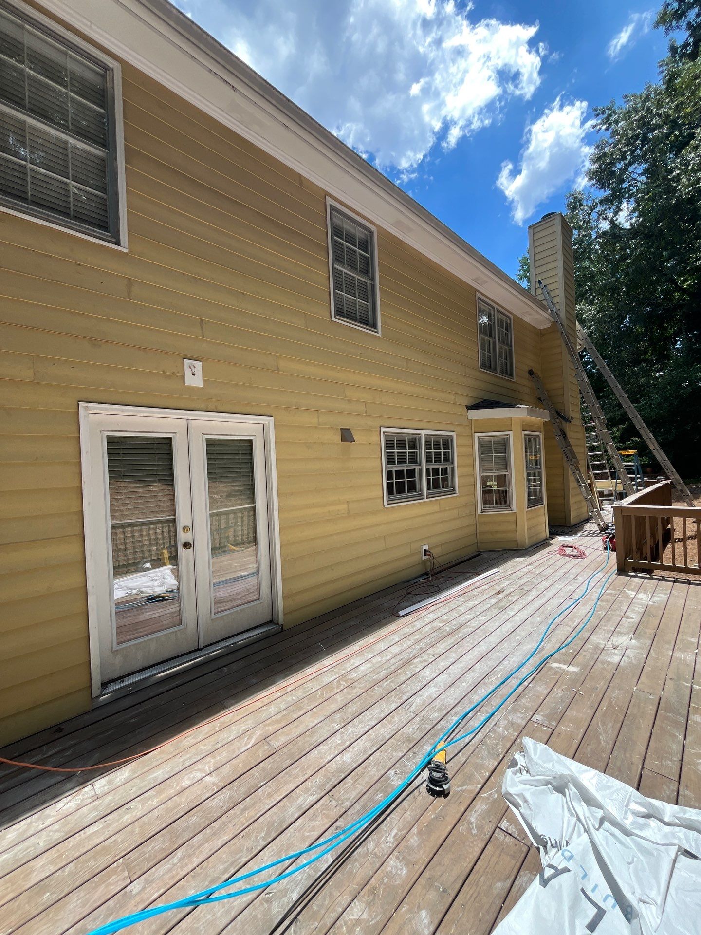 James Hardie Siding Installation, Rotten Wood Replacement, Porch Repairs, and Deck Resurfacing in Smyrna, GA by Nelson Exteriors 