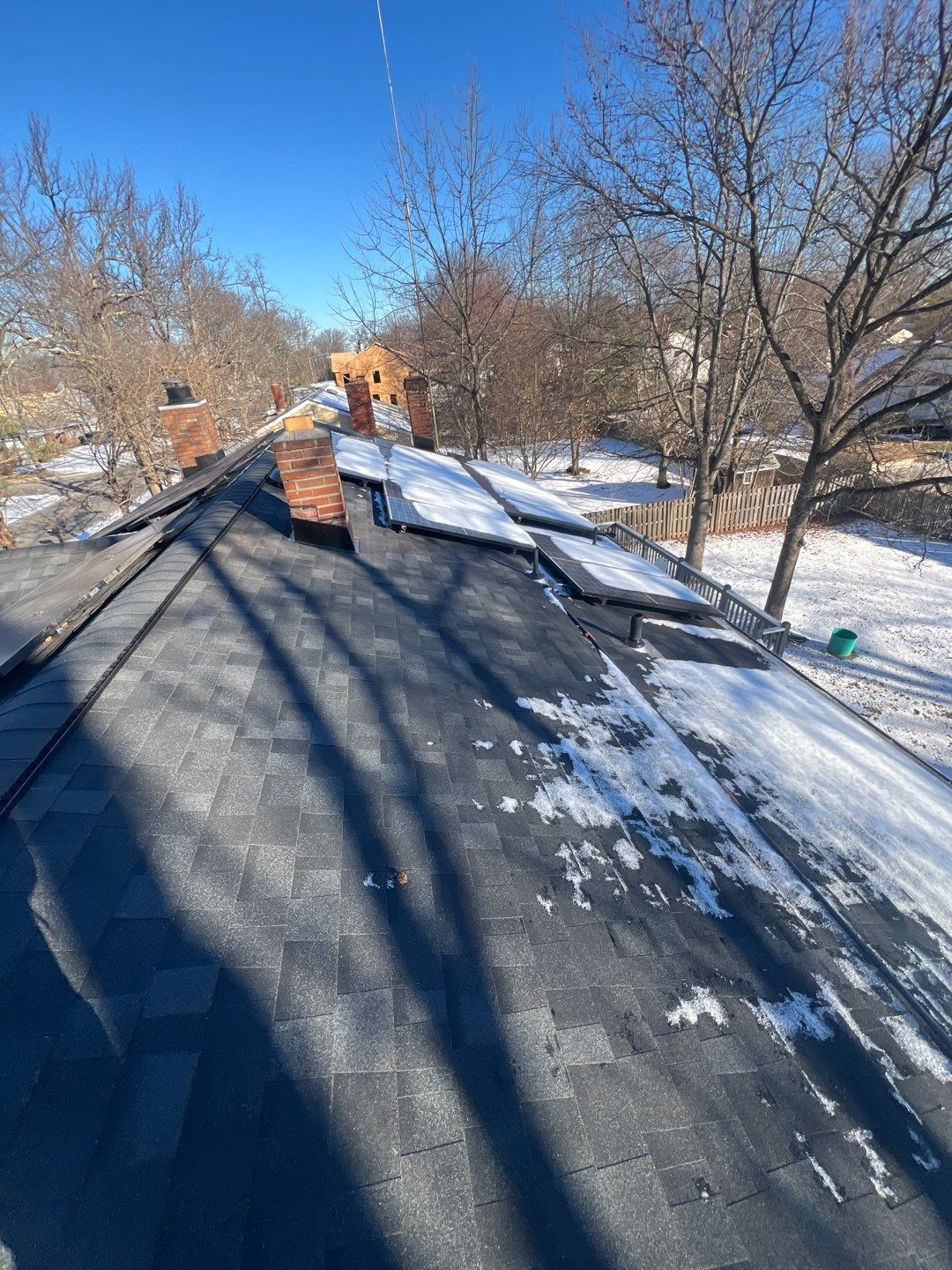 Onyx Black Shingles by Reimagine Roofing