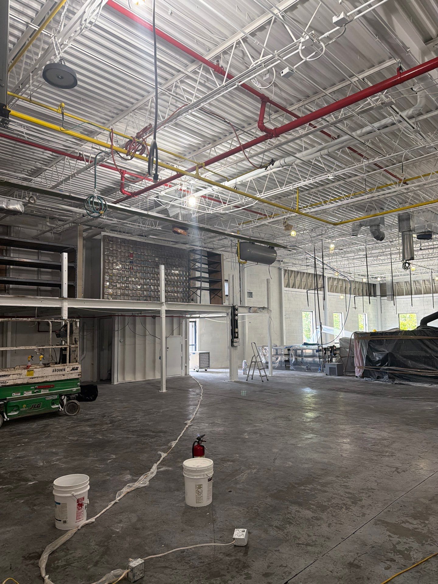Industrial Warehouse Fire Damage Cleaning and Spray Sealing in Islandia by EMS Restoration Corp