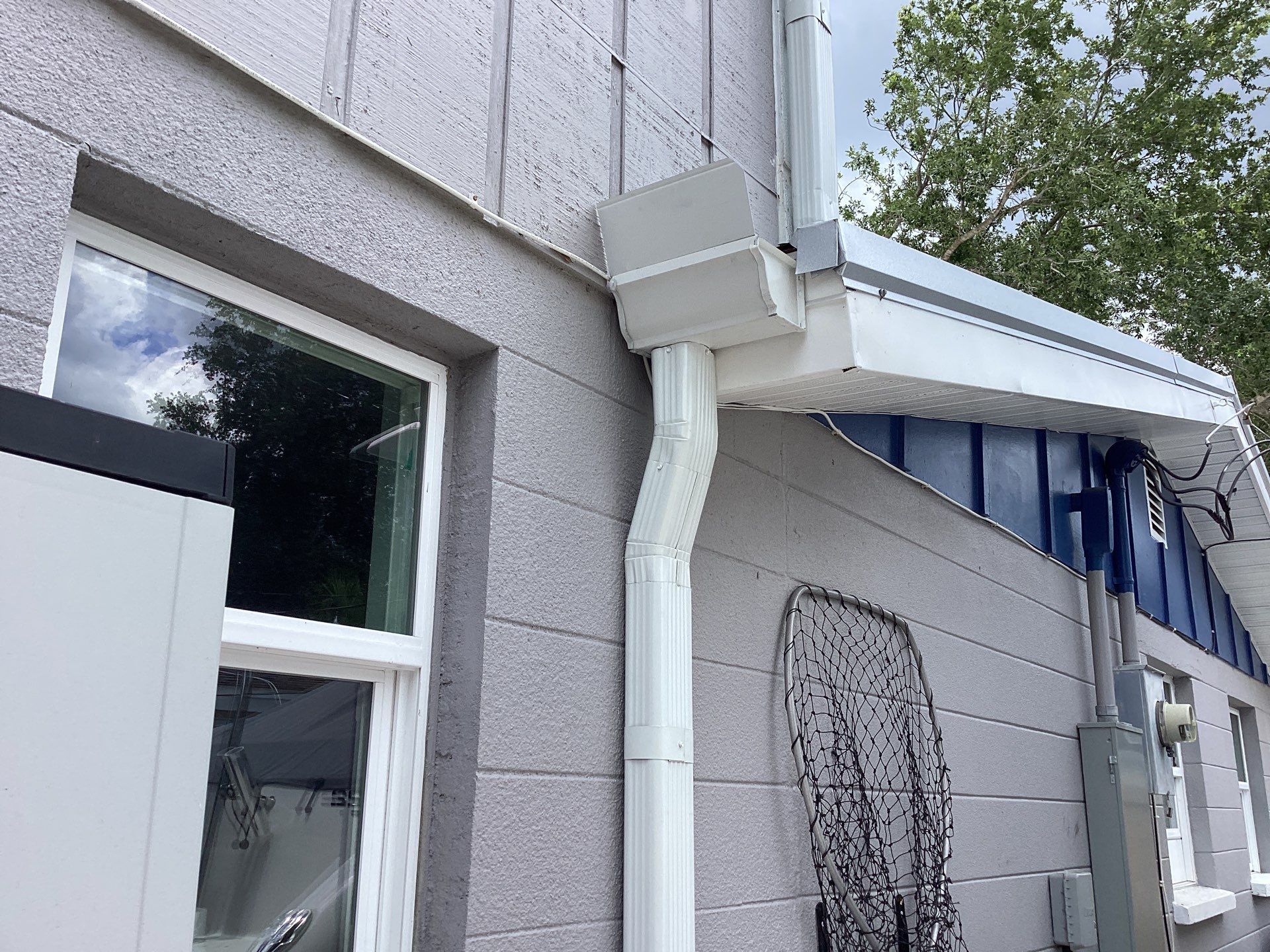 White K Style Seamless Gutters using 3X4 Elbow Downspout in Sarasota FL by Gutter Professors