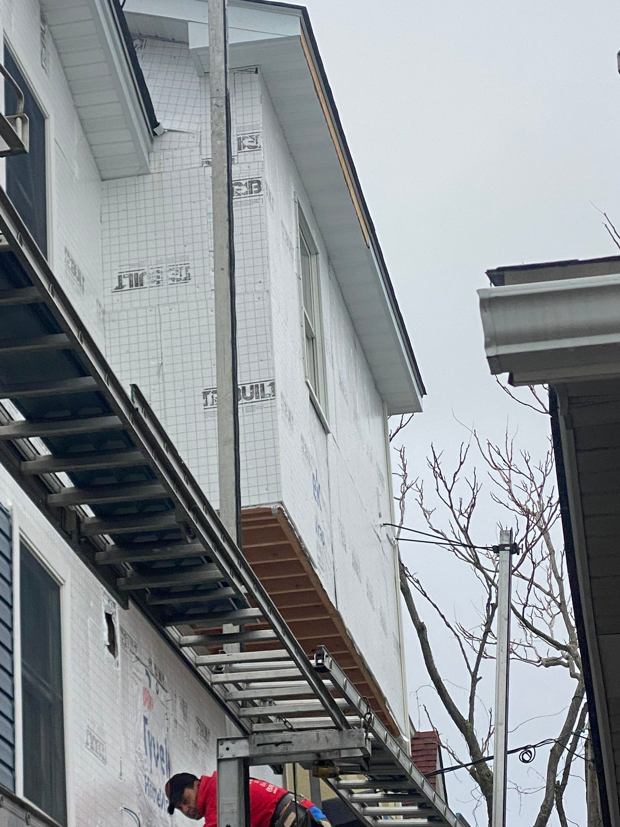 House lift in the westend of Long Beach. by Above All Gutters