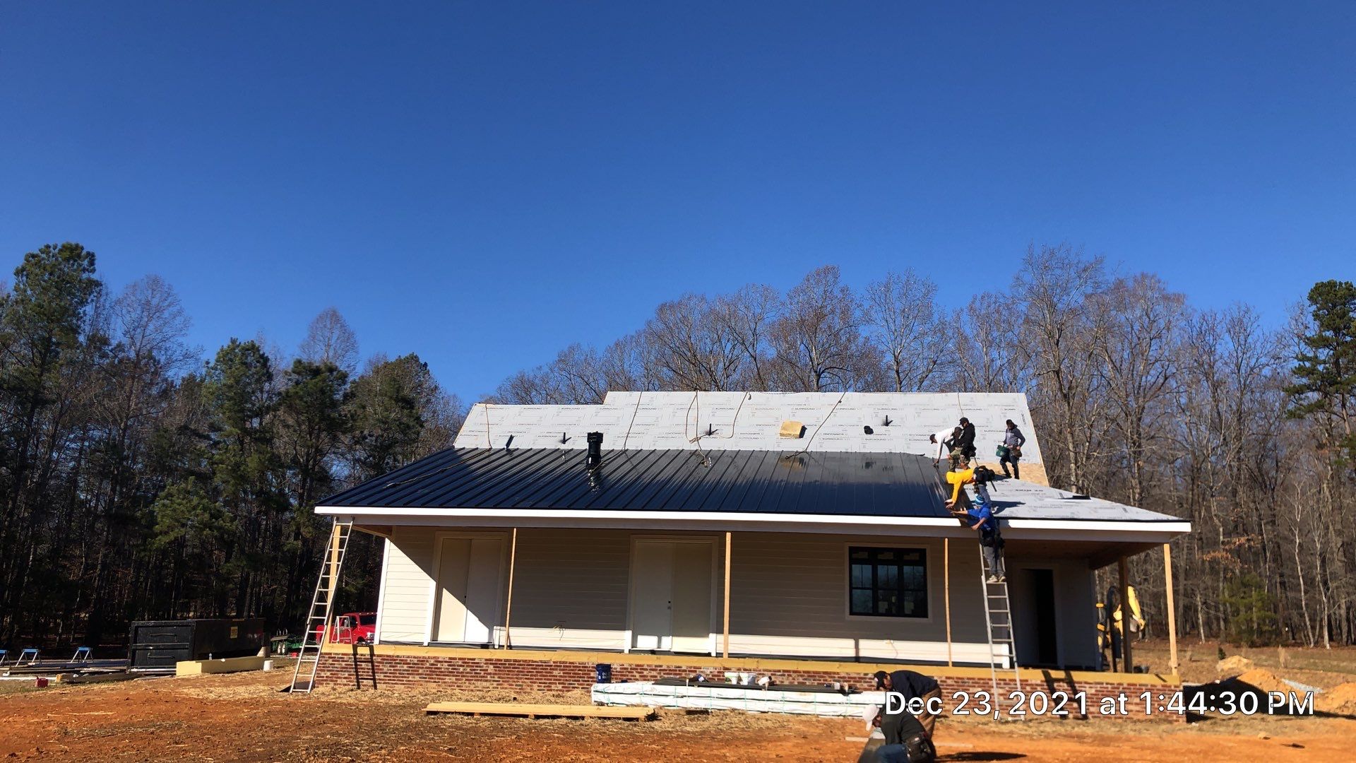 Custom Home Metal Roof Installation by Just In Time Roofing and Restoration