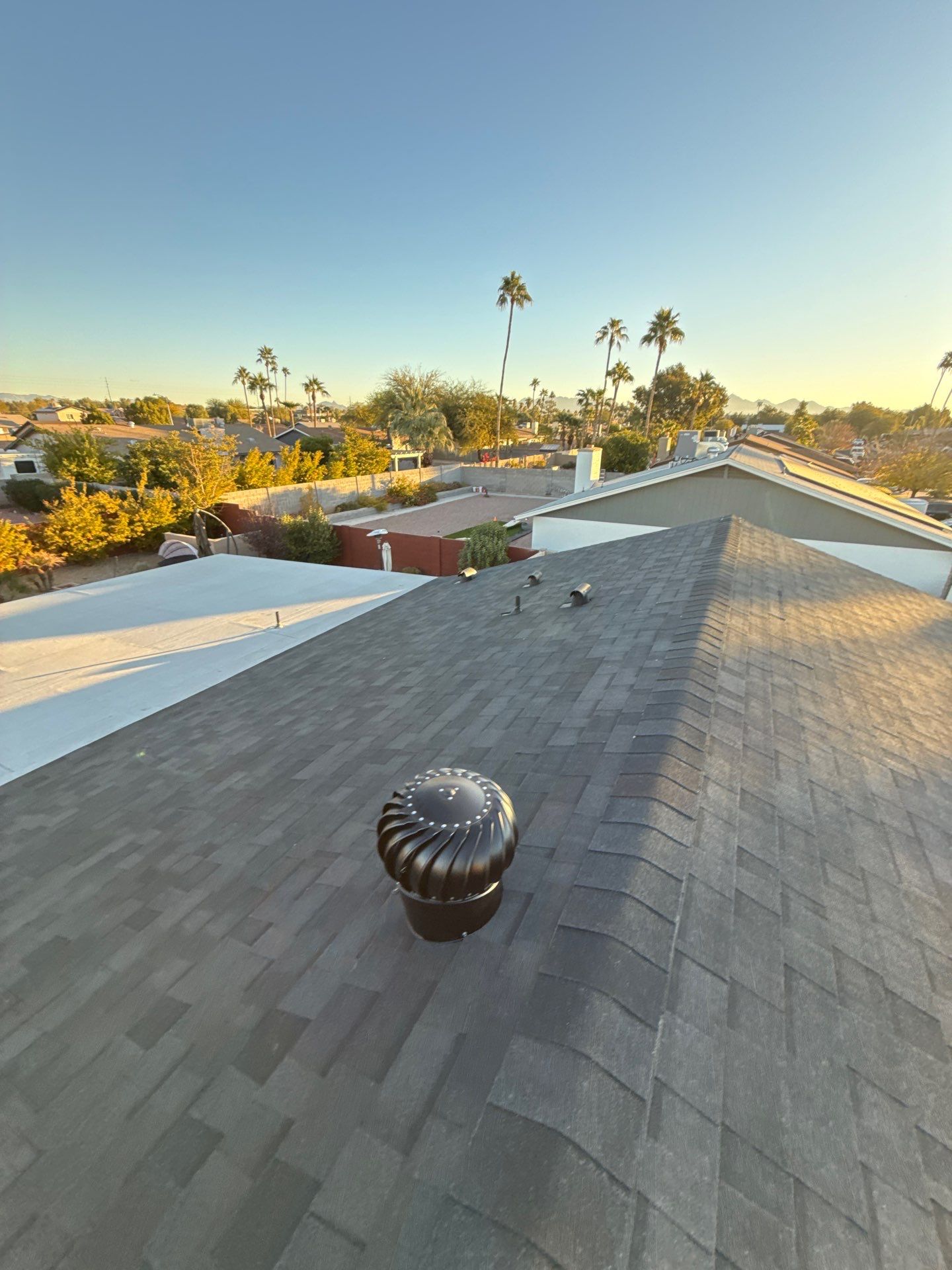 Onyx Black Shingles by Reimagine Roofing