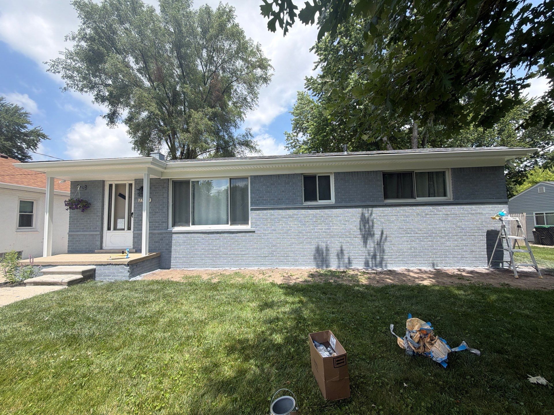 Exterior Brick Staining Transformation by Top Shelf Painter