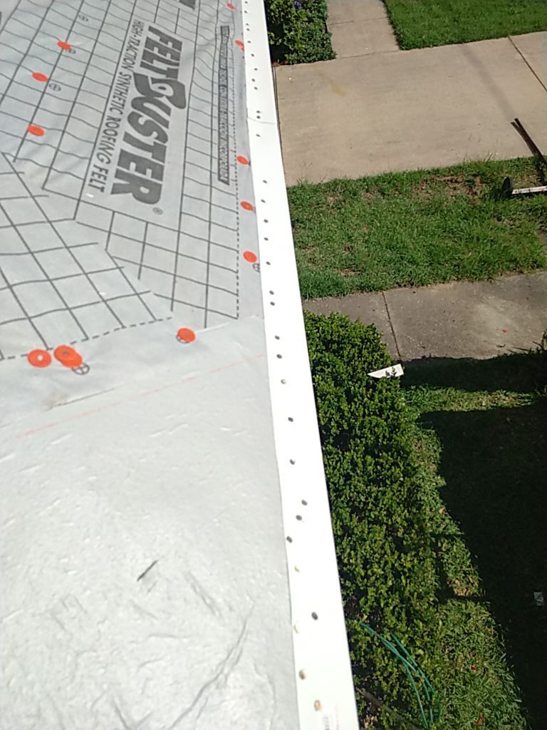 Residential Roofing Installation using Roof Replacement by American Roofing & Construction LLC