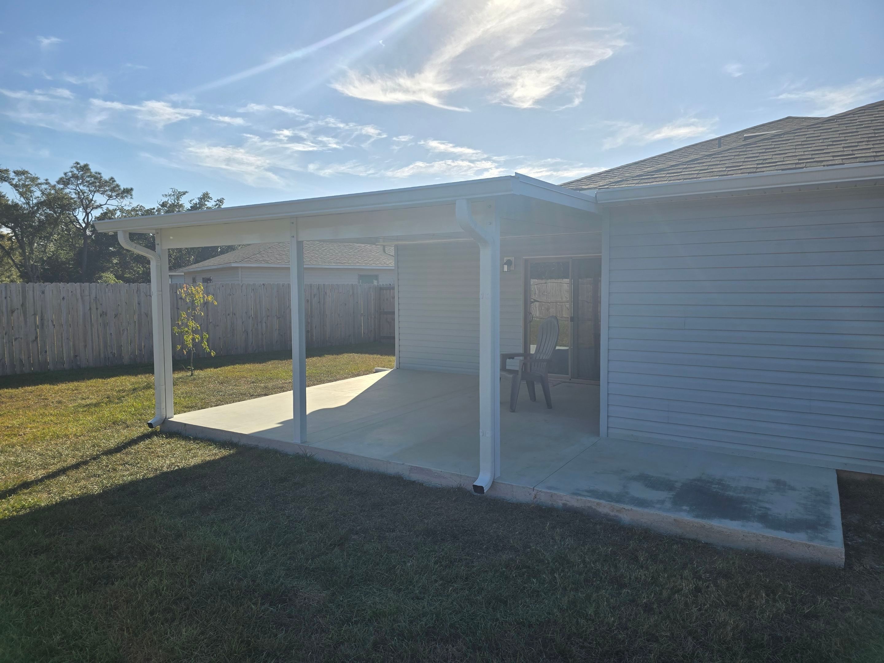 Backyard Patio Cover by Titan Sunrooms