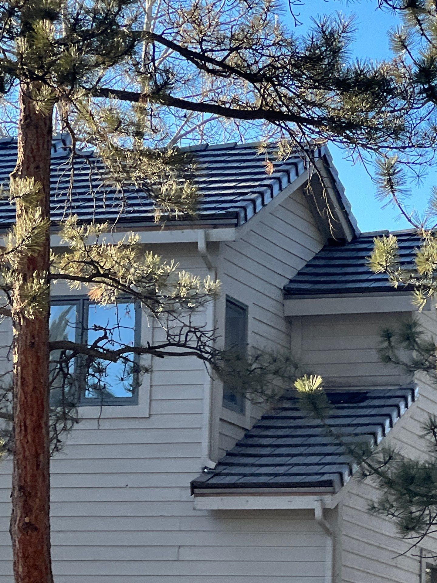 Residential Roofing Installation using Concrete Tile by Blue Peaks Roofing LLC 