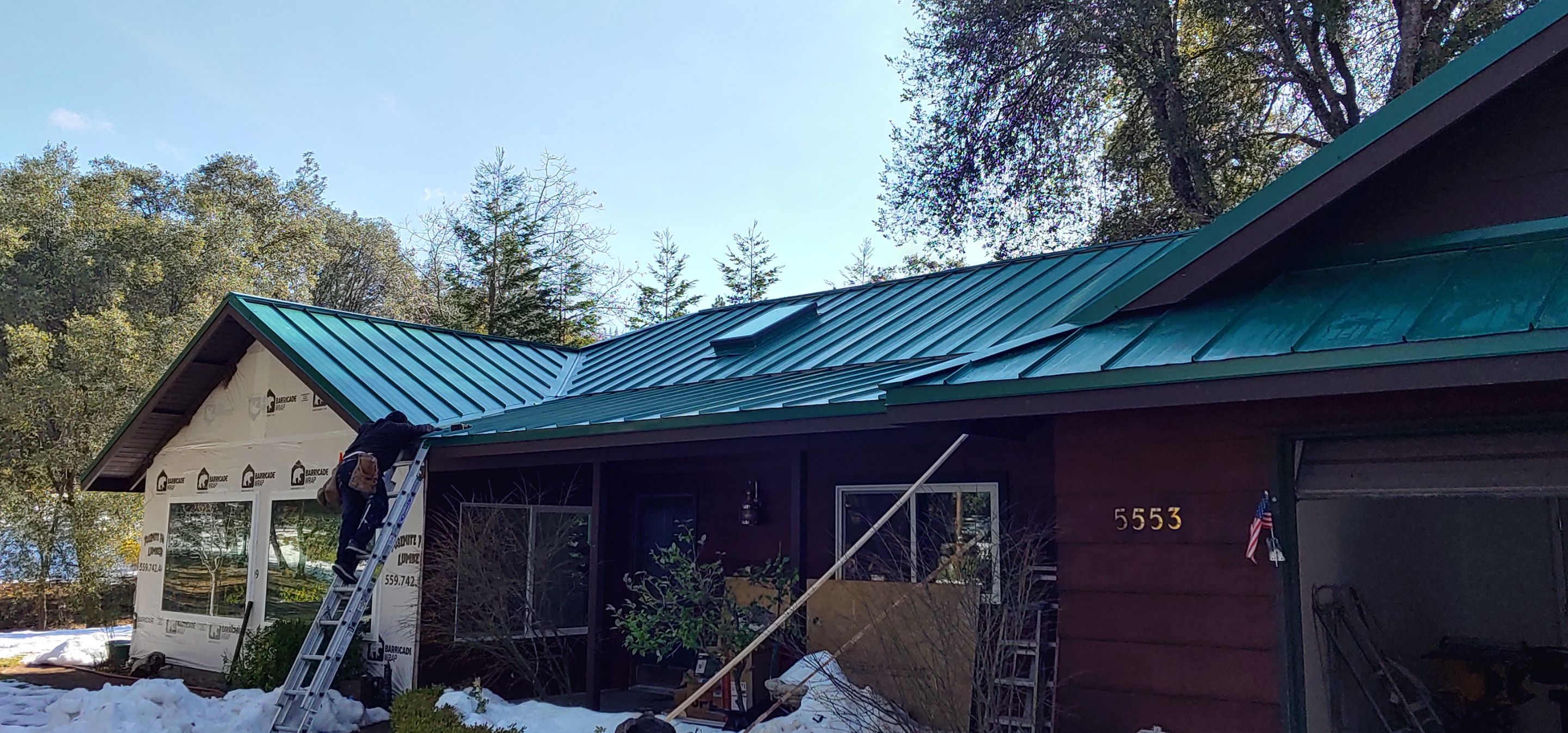 Metal roofing installation using Standing seam metal roofing system by Straight Edge Roofing Inc