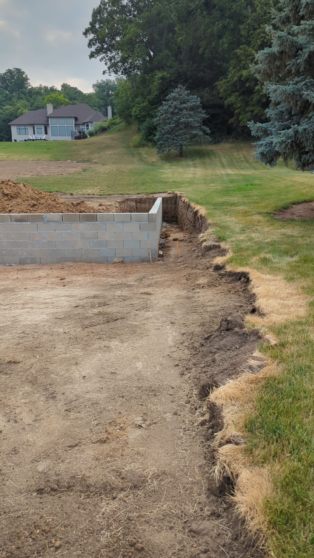 Fence / Retaining Wall using Block then parge by ACE Waterproofing & Basement Solutions