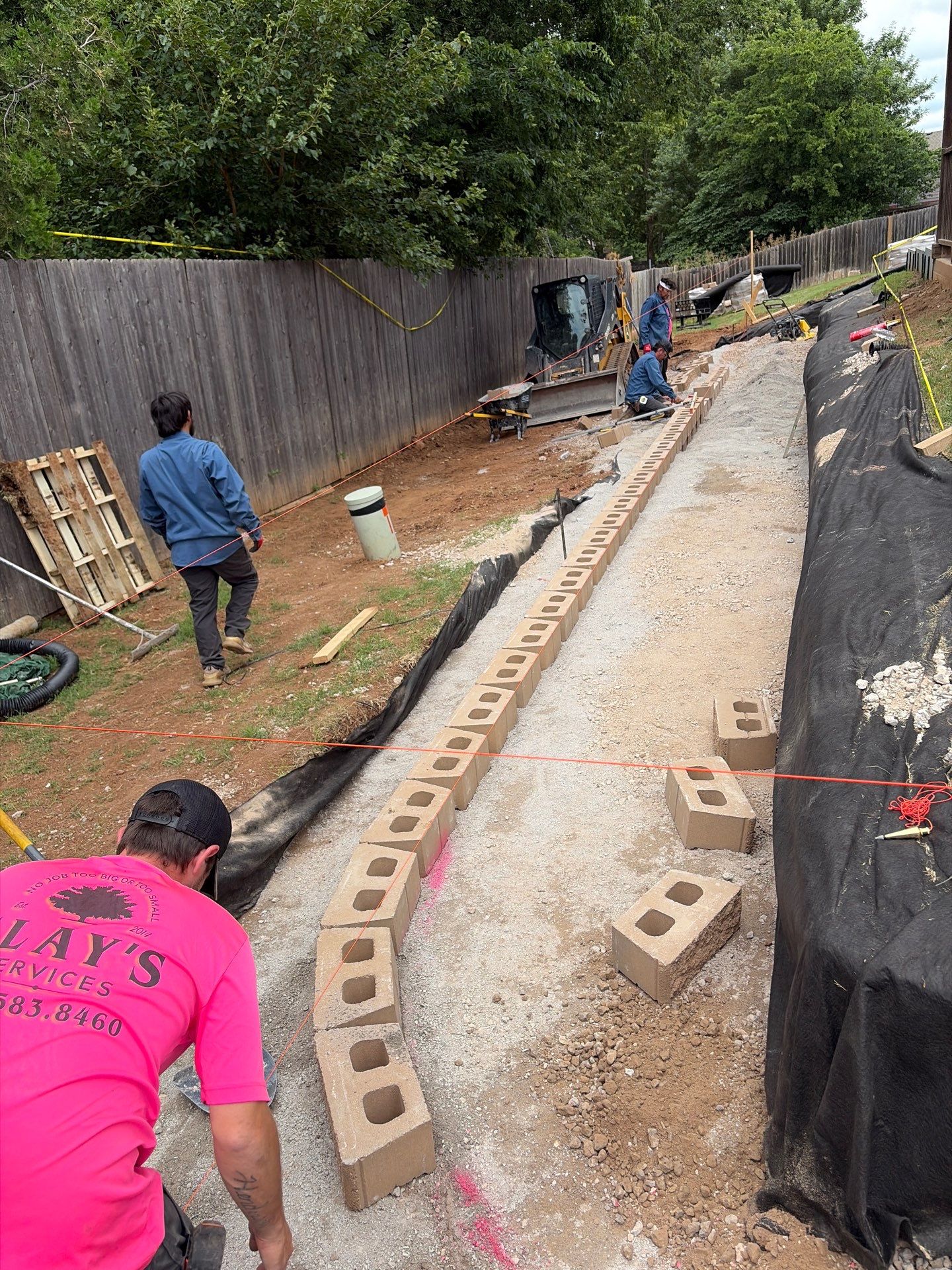 Custom Segmental Block Retaining Wall and Sod Installation in Lawton by Clays Services Inc