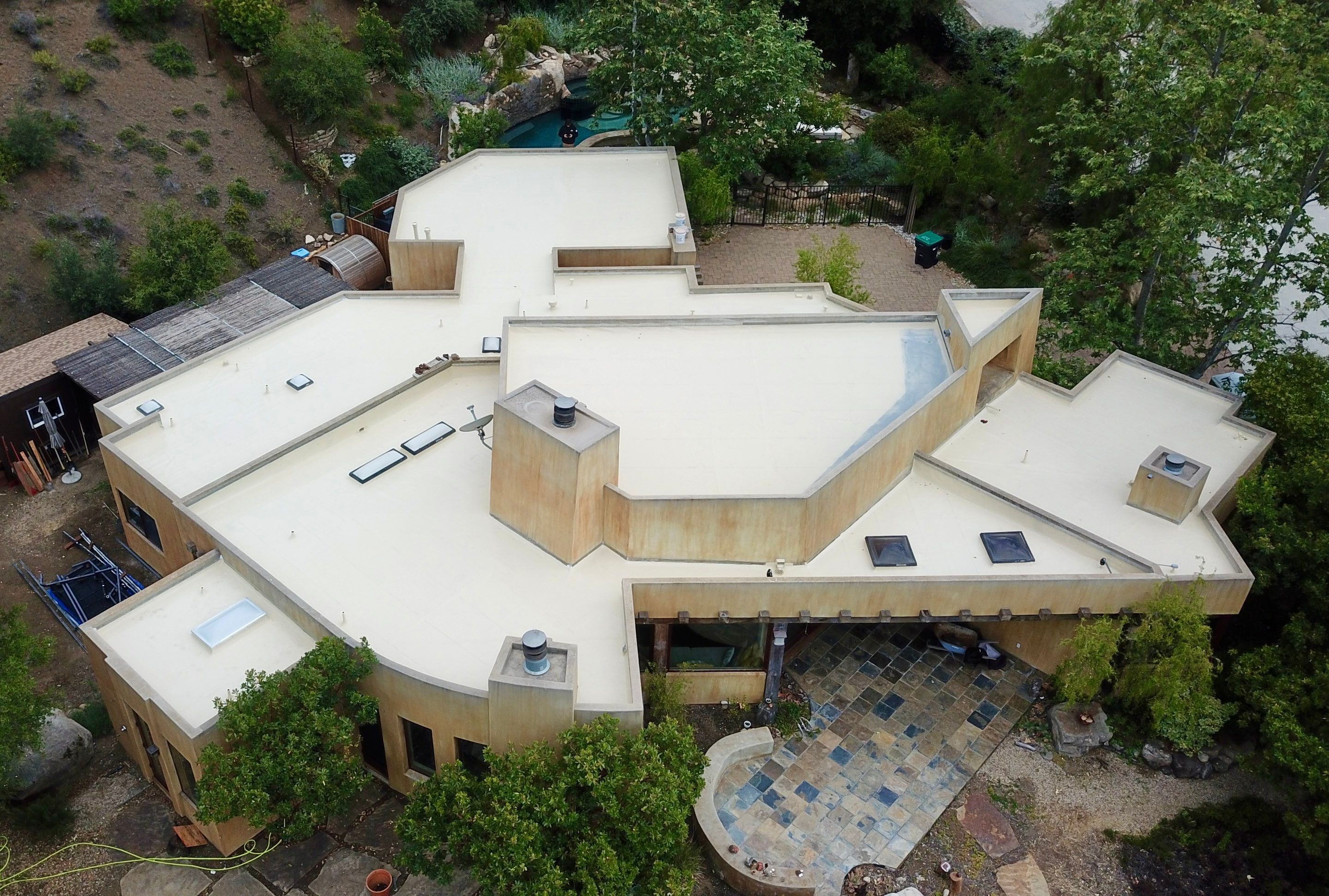 Tan Silicone Applied to a Stunning Residential Property in Calabasas by Hull Brothers Roofing