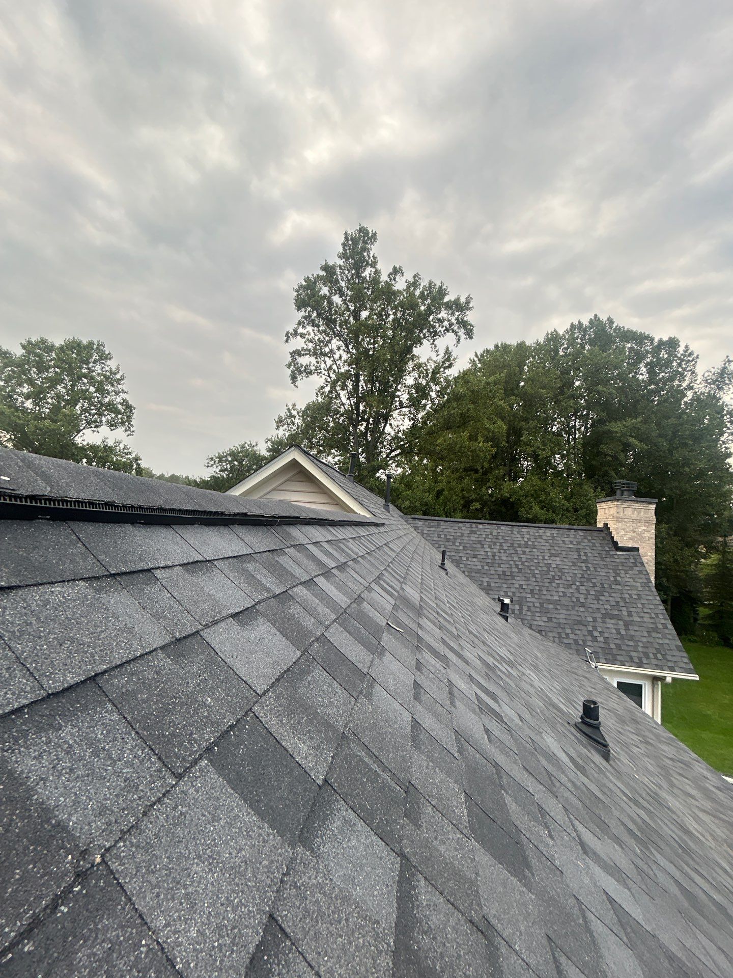 Great Falls : residential Roof with CertainTeed Landmark Pro in Max Def Moire Black  by RM Banning, Inc.