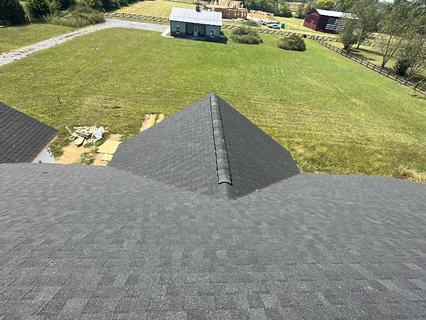 Residential Roofing Installation using Tamko Heritage AR with Standing Seam Metal Porch by Undersun Roofing 